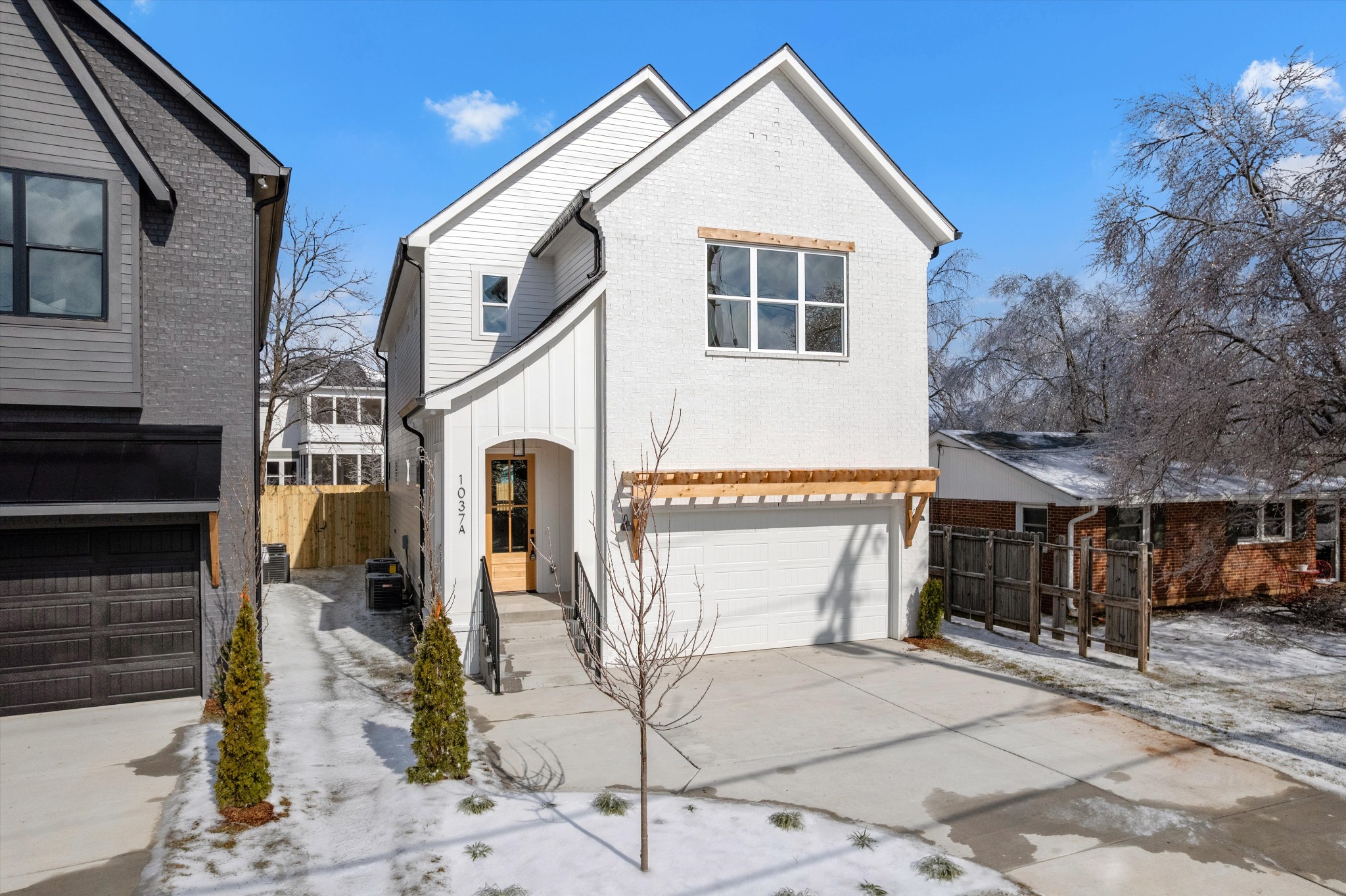 1037 Mitchell Road, Unit A Nashville, TN 37206 - Photo 2 of 3 a front view of a house with parking