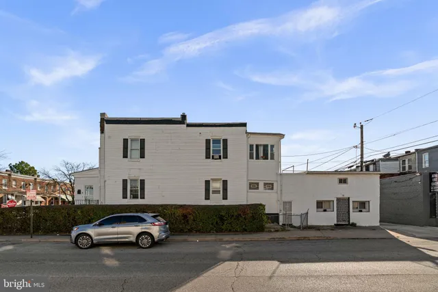 a view of a house with a street