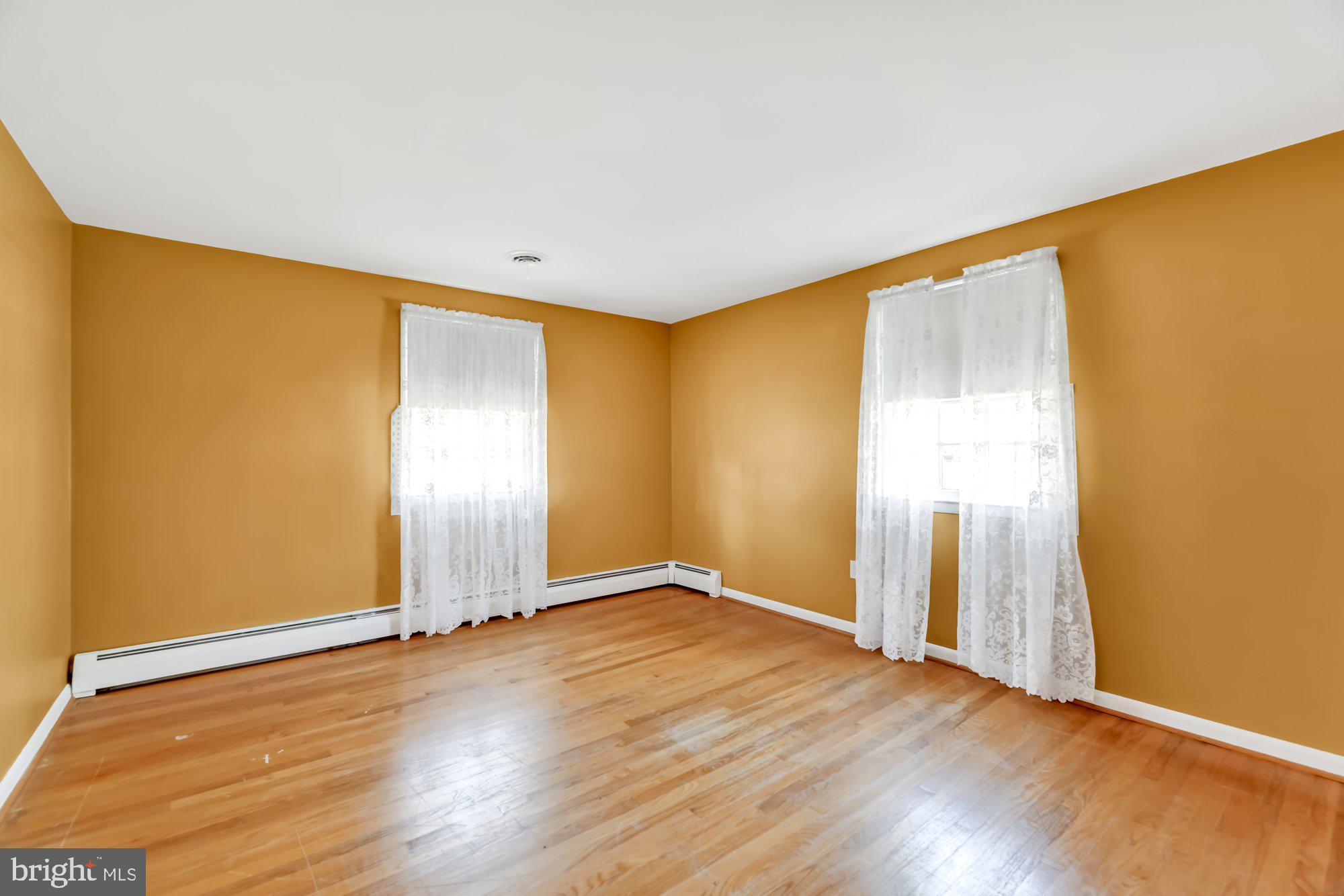 2115 Forest Ridge Road Lutherville-Timonium, MD 21093 - Photo 21 of 37 Bedroom 2 with Hardwood Flooring