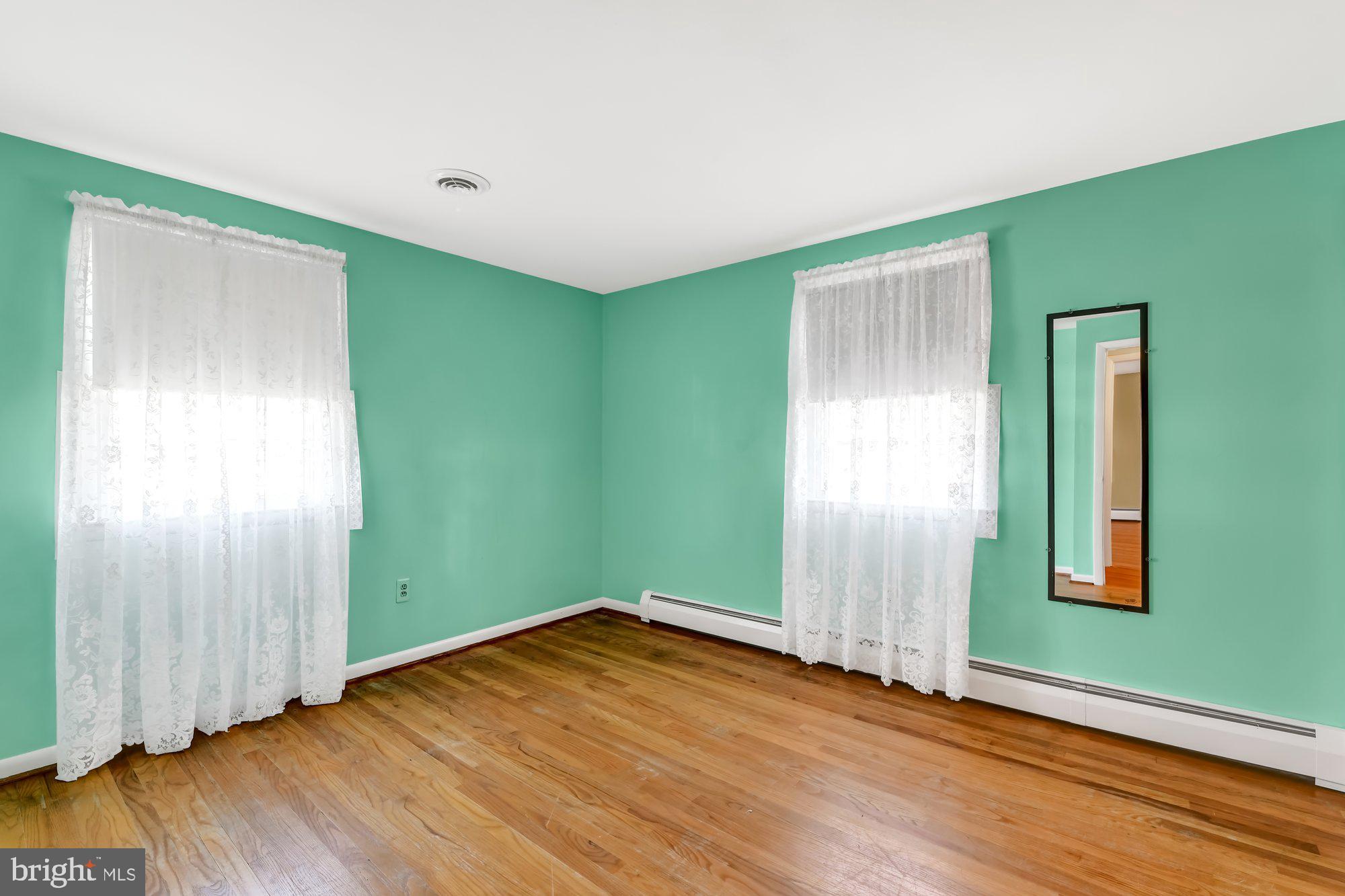 2115 Forest Ridge Road Lutherville-Timonium, MD 21093 - Photo 22 of 37 Bedroom 3 with Hardwood Flooring