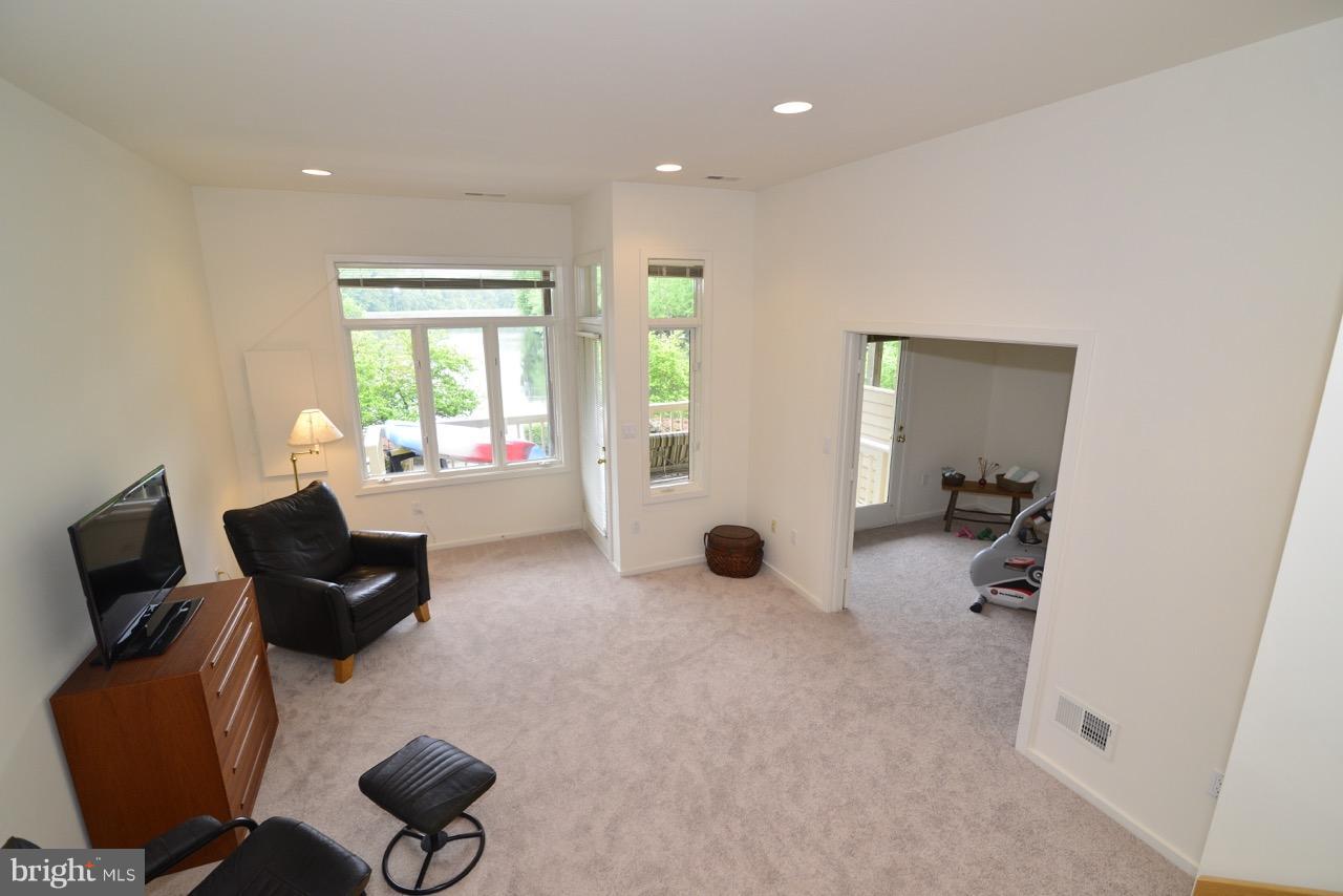 11506 Hemingway Drive Reston, VA 20194 - Photo 21 of 30 Lower level recreation room with small bar space