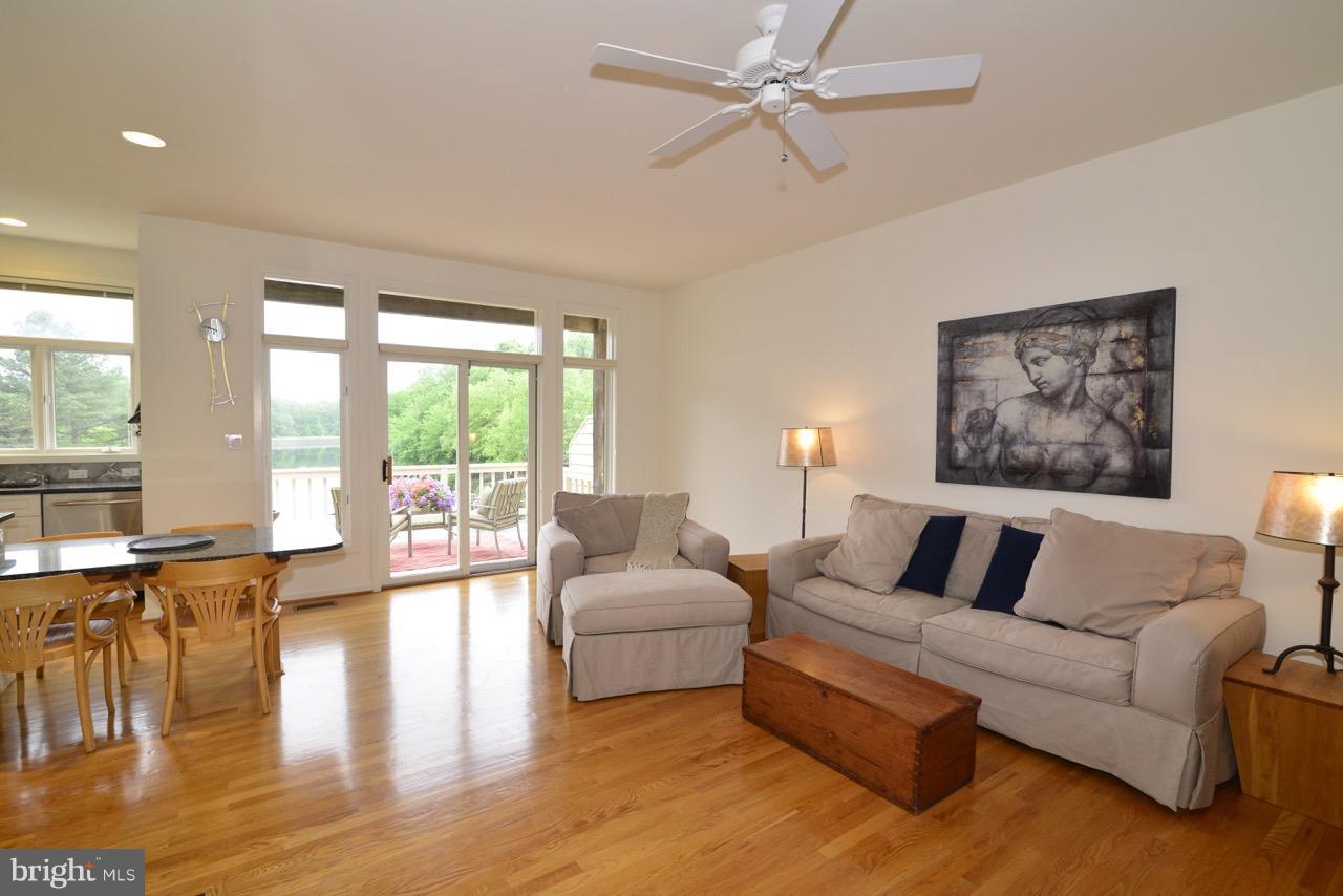 11506 Hemingway Drive Reston, VA 20194 - Photo 5 of 30 Great light from the deck makes family room shine