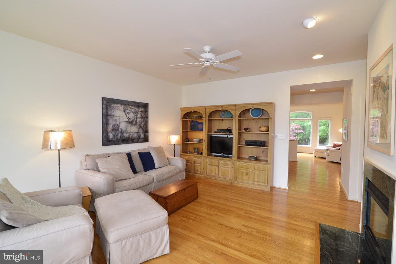 11506 Hemingway Drive Reston, VA 20194 - Photo 6 of 30 Large family room has great fireplace high ceiling