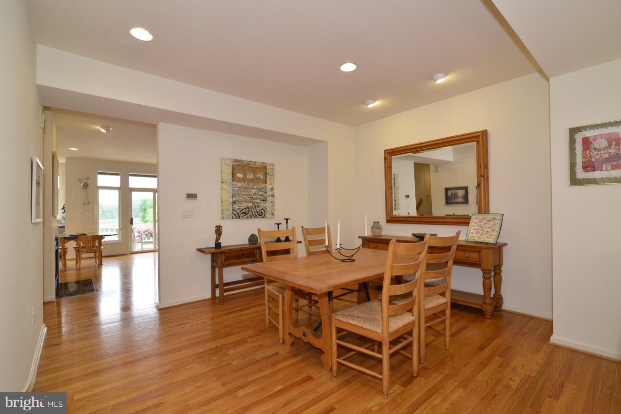 11506 Hemingway Drive Reston, VA 20194 - Photo 7 of 30 Dining room continues with the bright hardwoods