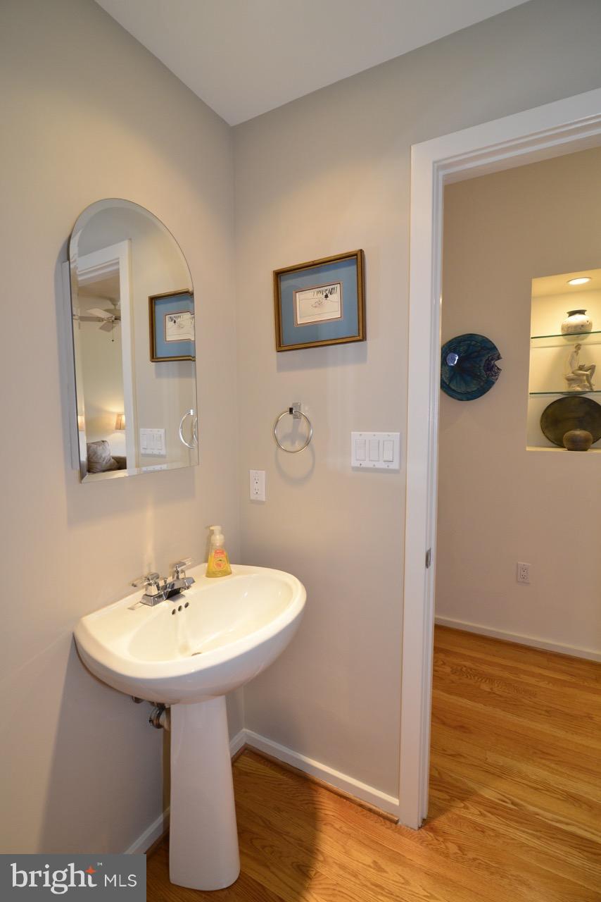 11506 Hemingway Drive Reston, VA 20194 - Photo 10 of 30 Powder room on main level for convenience