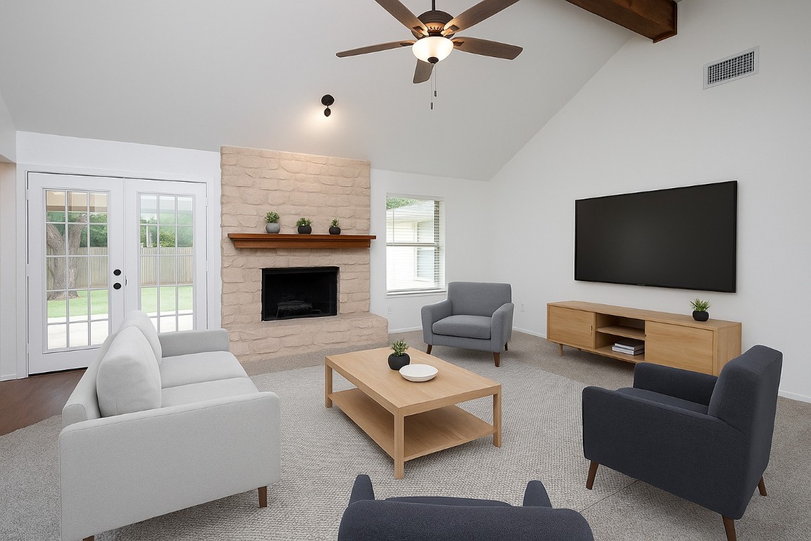 910 Garden View Drive Georgetown, TX 78628 - Photo 4 of 28 a living room with furniture and a flat screen tv