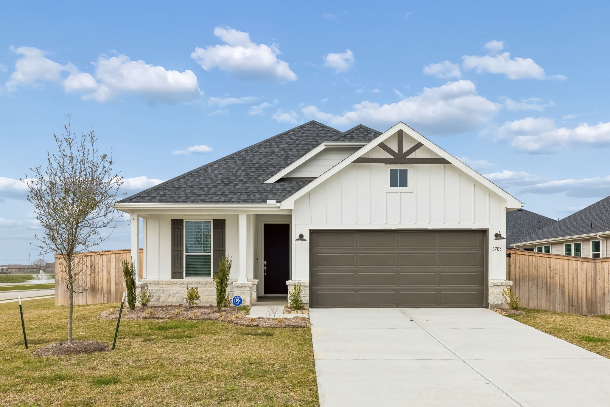 6703 Alejandro Place Cove, TX 77523 - Photo 1 of 30 a front view of house with yard and garage