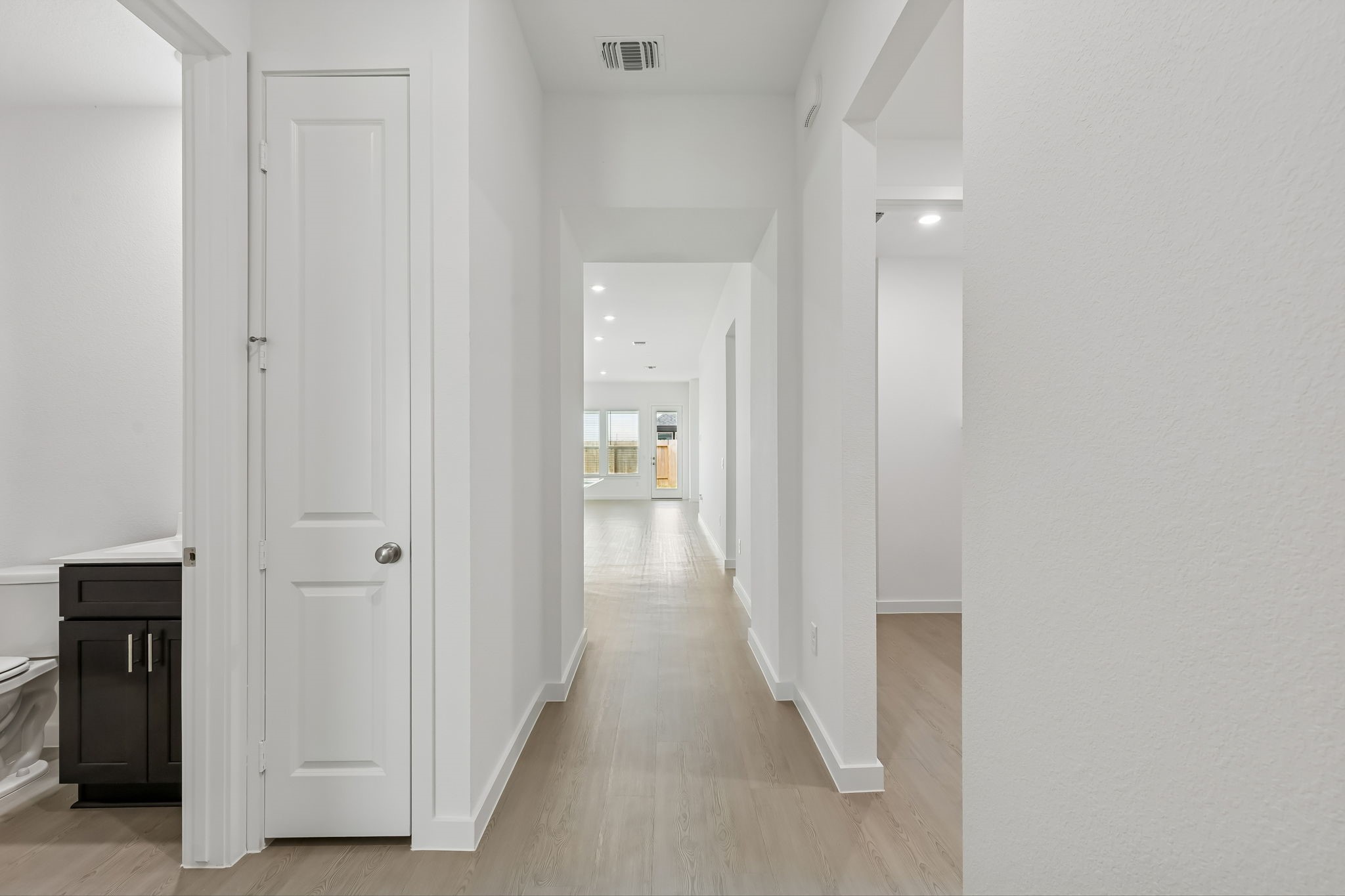 6703 Alejandro Place Cove, TX 77523 - Photo 2 of 30 a view of a hallway with wooden floor