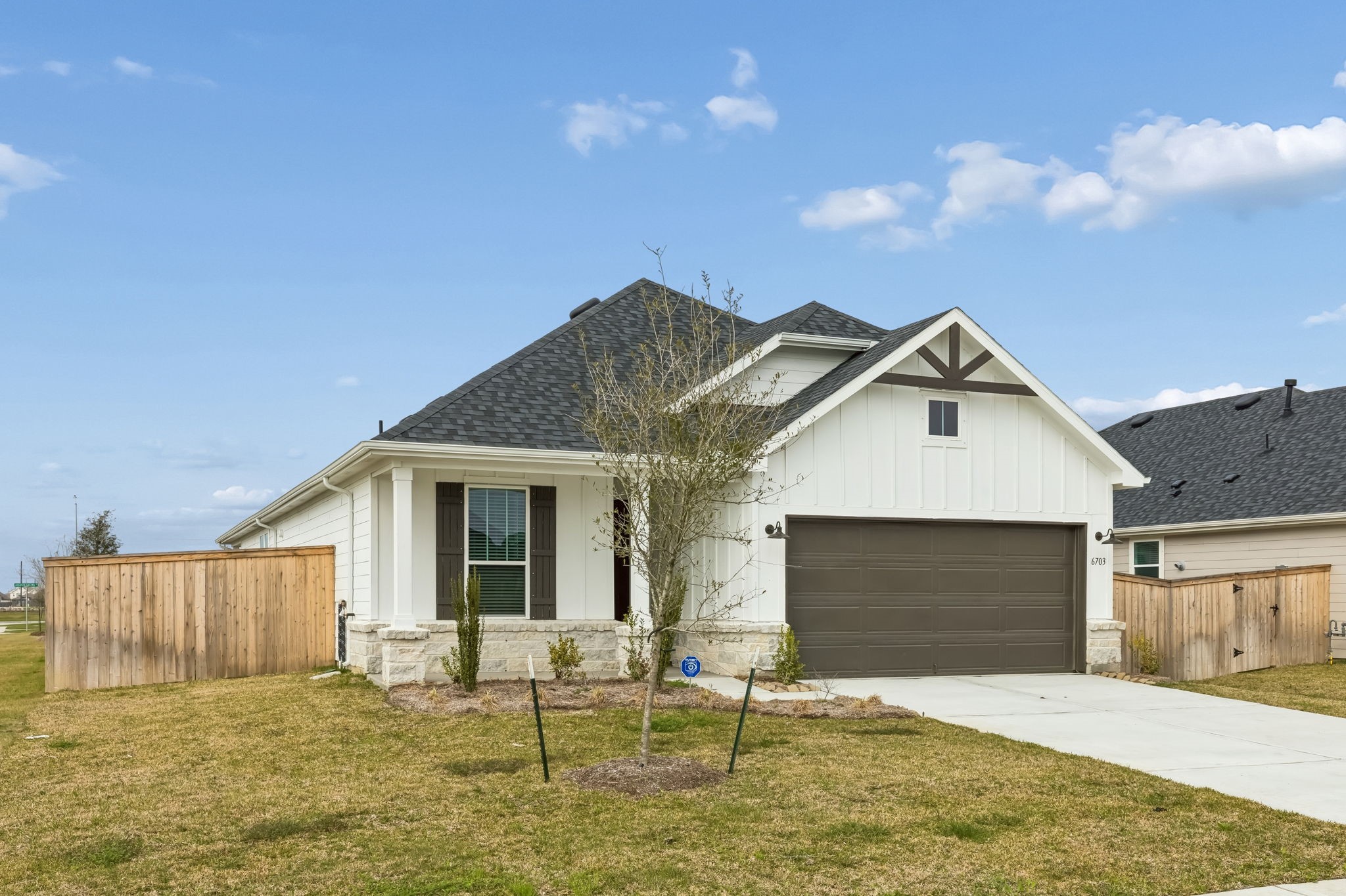 6703 Alejandro Place Cove, TX 77523 - Photo 23 of 30 a backyard of a house with table and chairs