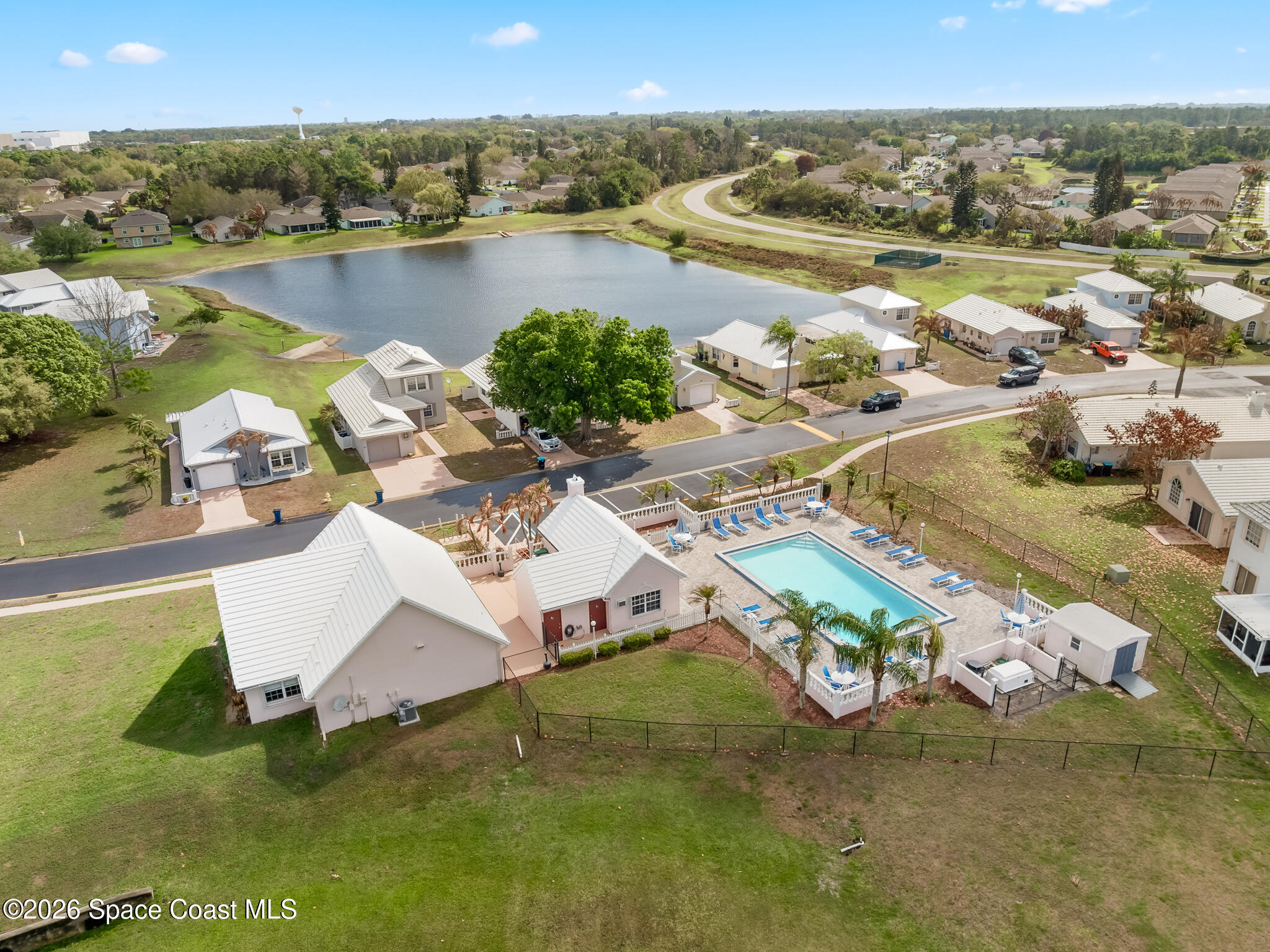 865 Dewberry Terrace Northeast Palm Bay, FL 32905 - Photo 24 of 29 an aerial view of residential houses with outdoor space