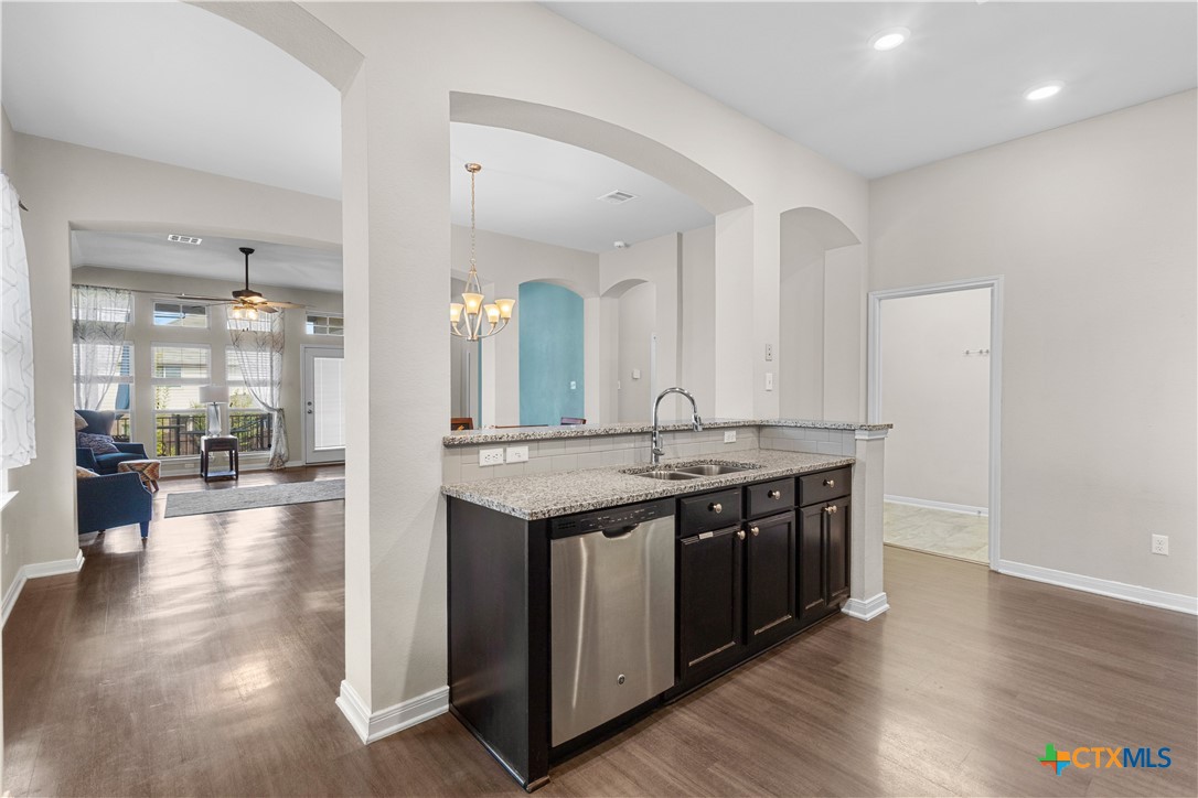 3615 Addison Street Killeen, TX 76542 - Photo 13 of 47 a spacious bathroom with a granite countertop double vanity and a mirror