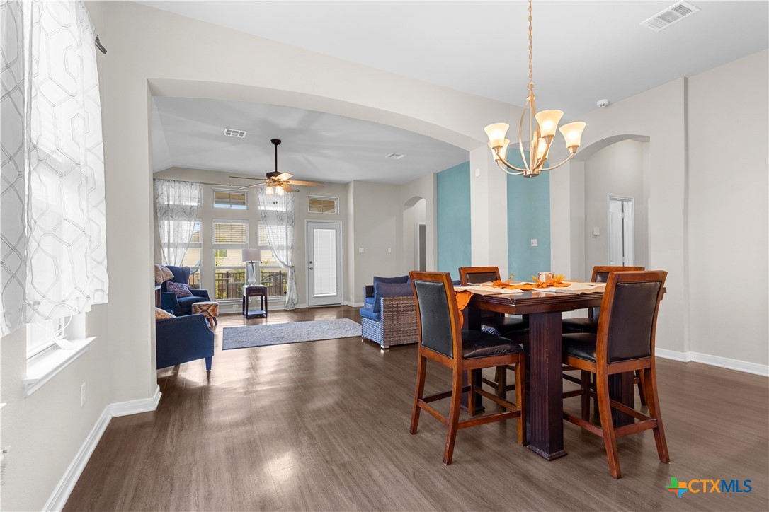 3615 Addison Street Killeen, TX 76542 - Photo 16 of 47 a view of a dining room with furniture window and wooden floor