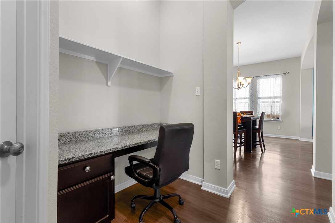 3615 Addison Street Killeen, TX 76542 - Photo 21 of 47 a view of a workspace with furniture and wooden floor