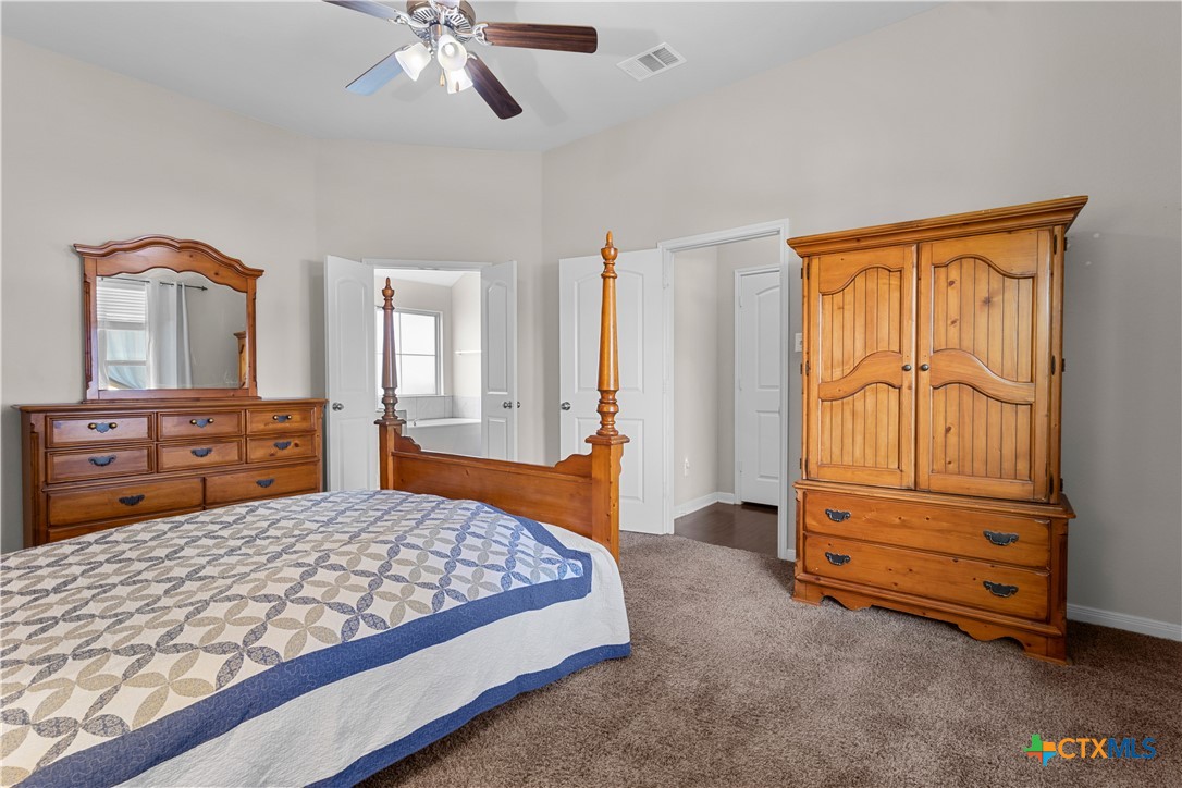 3615 Addison Street Killeen, TX 76542 - Photo 24 of 47 a bedroom with a bed and a dresser