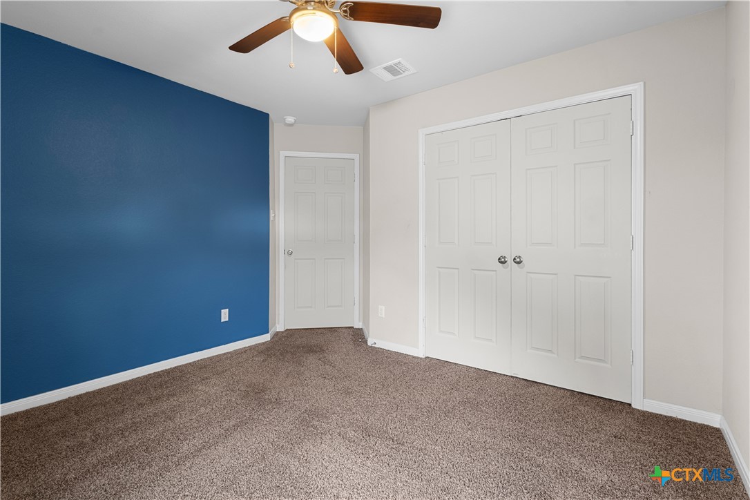 3615 Addison Street Killeen, TX 76542 - Photo 33 of 47 an empty room with a empty space and a ceiling fan