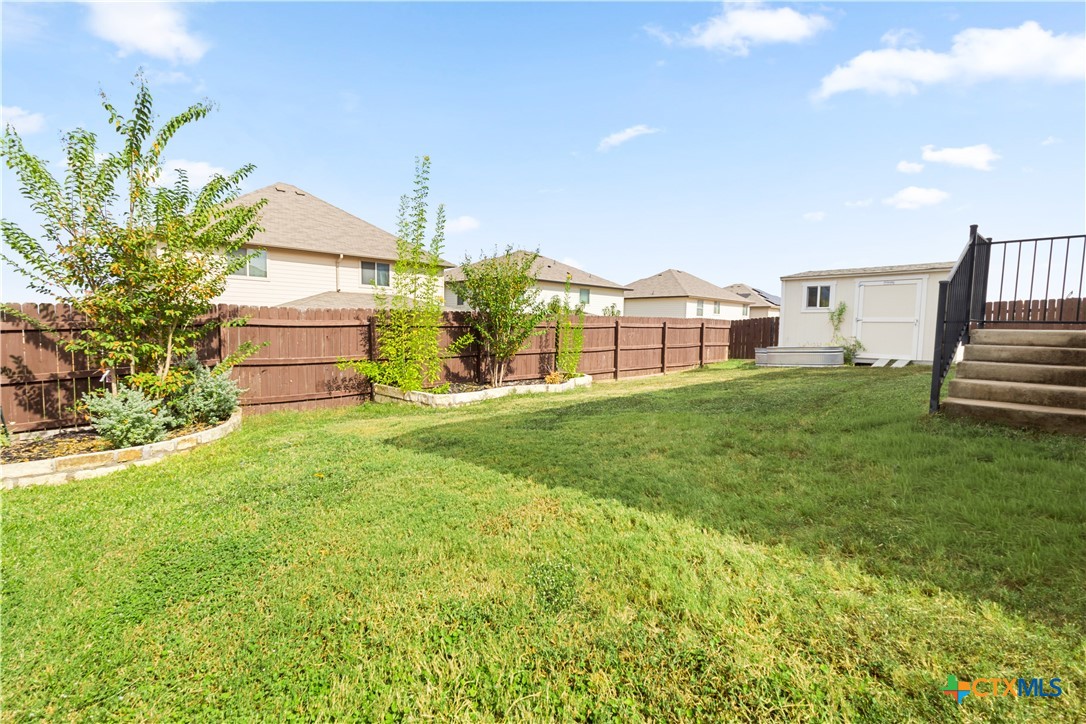 3615 Addison Street Killeen, TX 76542 - Photo 46 of 47 a view of a house with a big yard and large trees