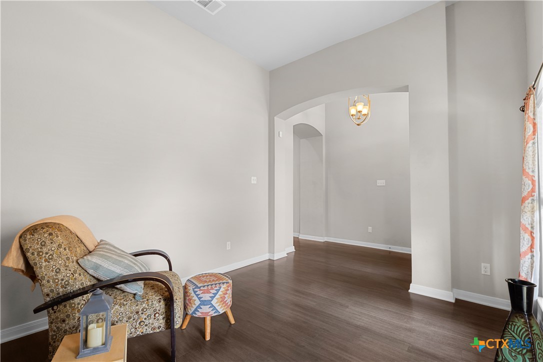3615 Addison Street Killeen, TX 76542 - Photo 8 of 47 a view of a room with wooden floor and lounge chair