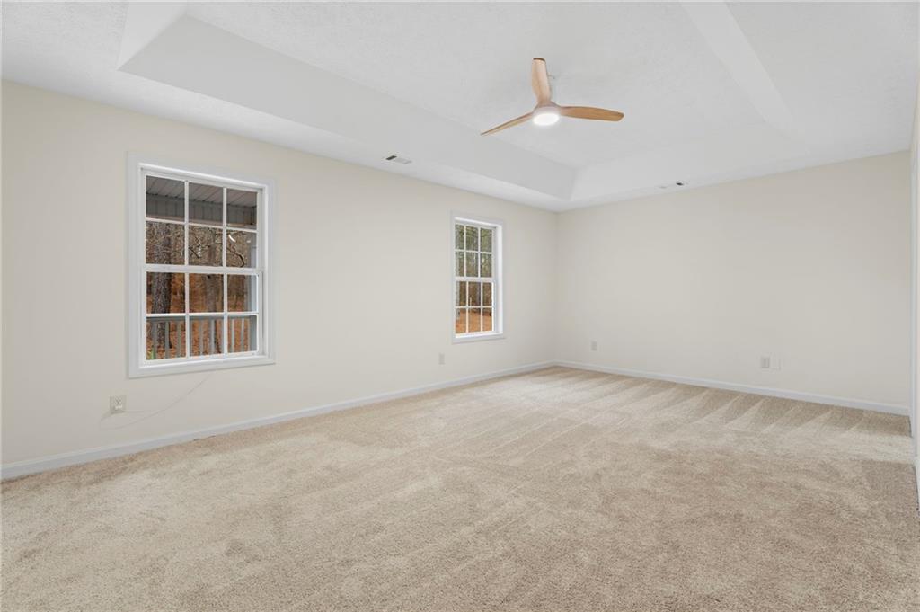 1227 Al Roberts Road Senoia, GA 30276 - Photo 30 of 43 an empty room with a window
