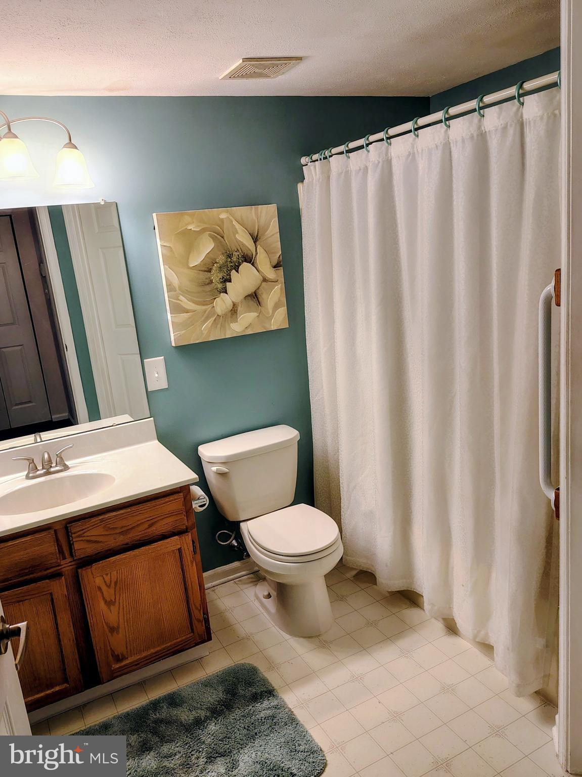 2803 Sweetleaf Terrace Mount Laurel, NJ 08054 - Photo 11 of 13 a bathroom with a toilet and shower