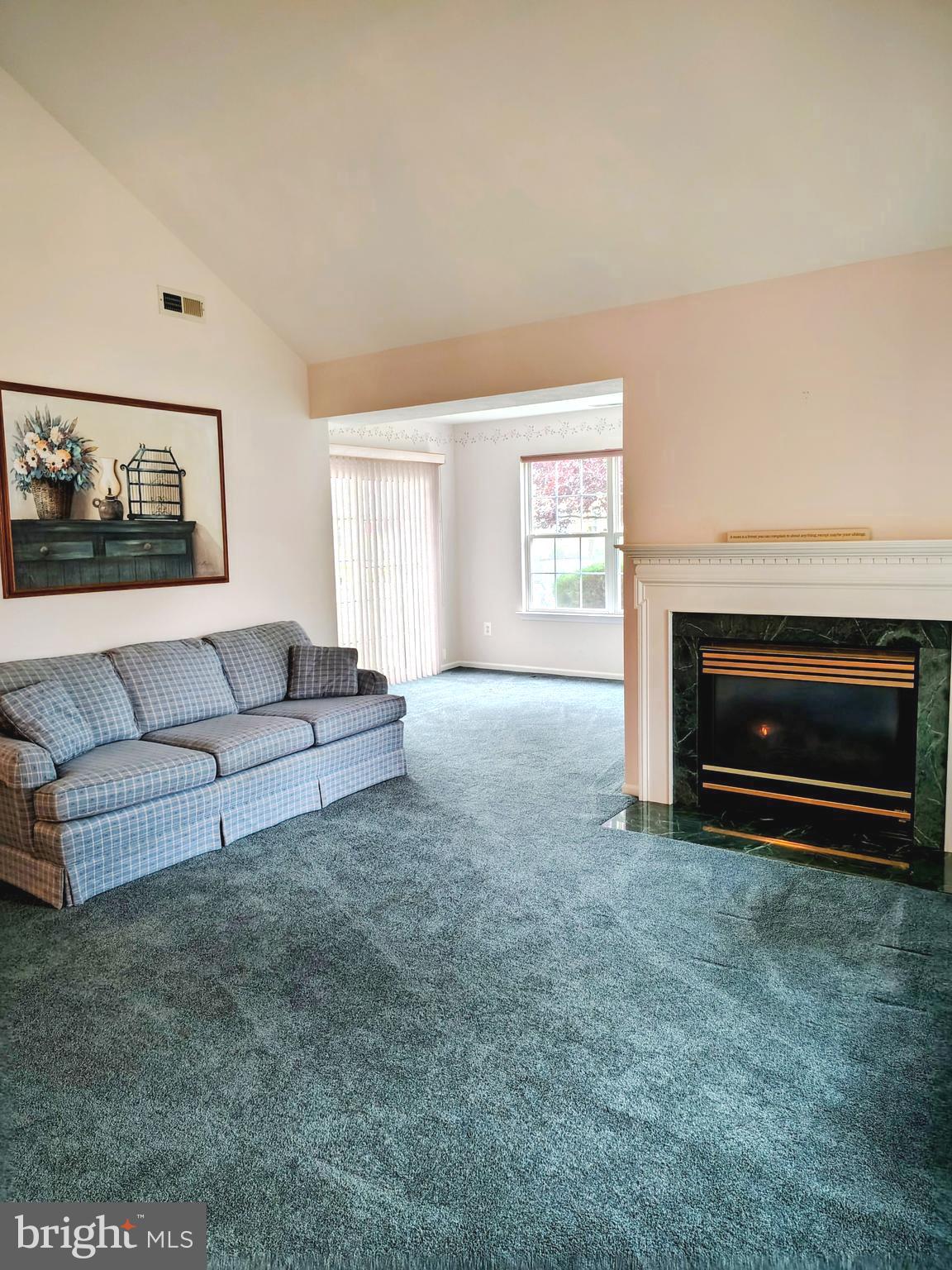 2803 Sweetleaf Terrace Mount Laurel, NJ 08054 - Photo 4 of 13 a living room with furniture and a fireplace