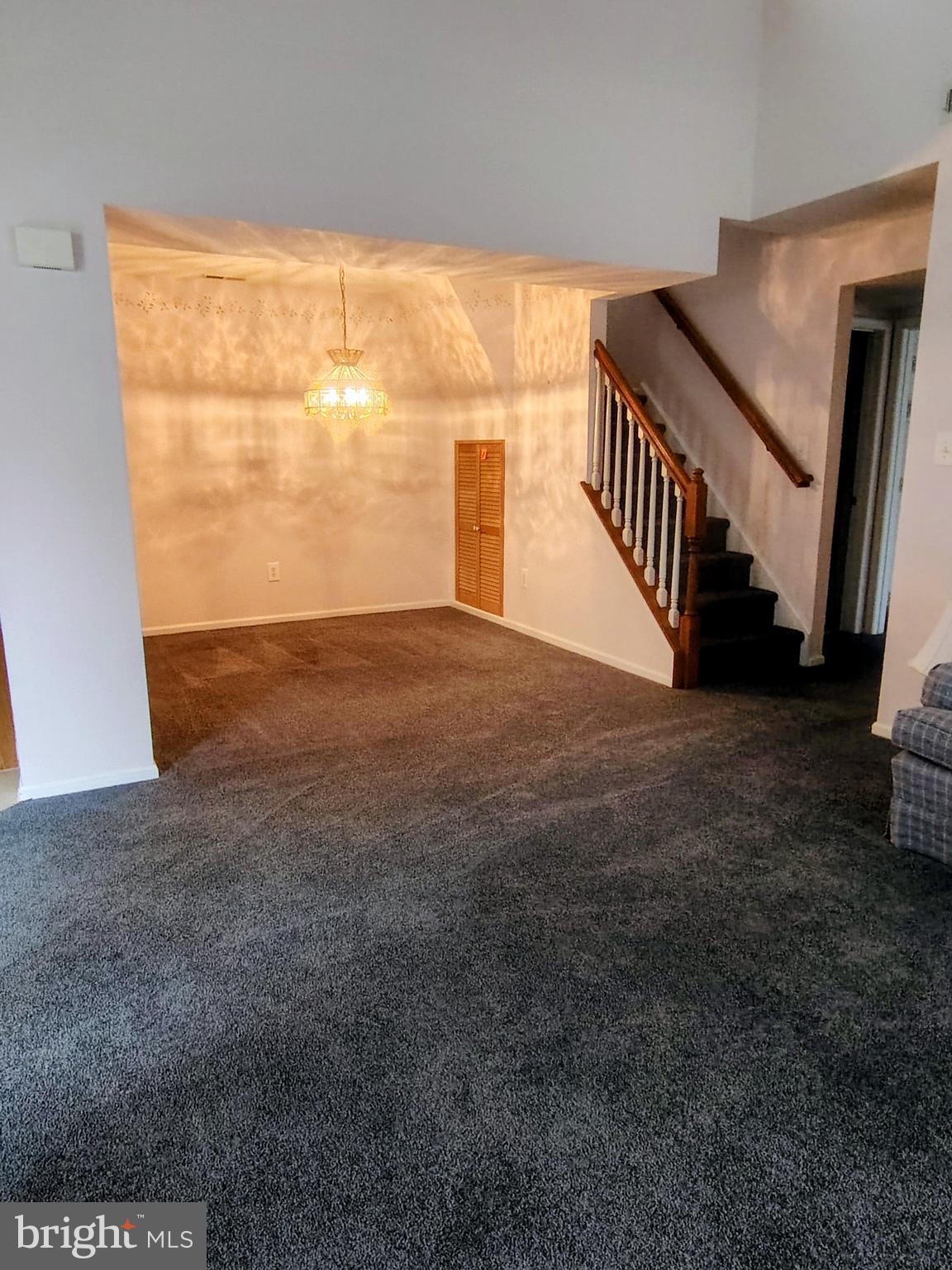 2803 Sweetleaf Terrace Mount Laurel, NJ 08054 - Photo 6 of 13 a view of an empty room with wooden floor and a window