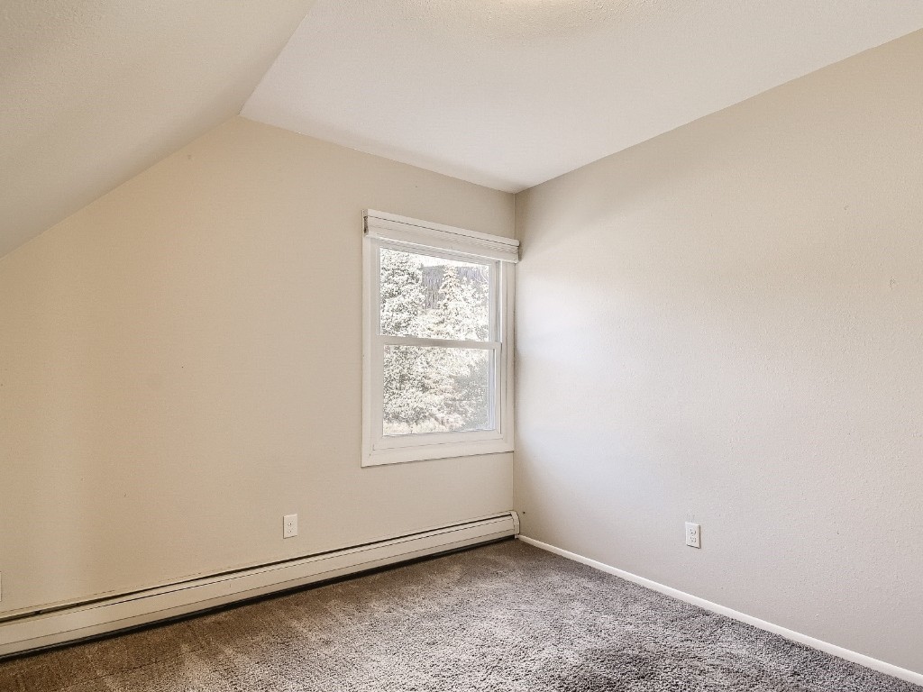 402 Alpine Road Dillon, CO 80435 - Photo 14 of 21 an empty room with a window