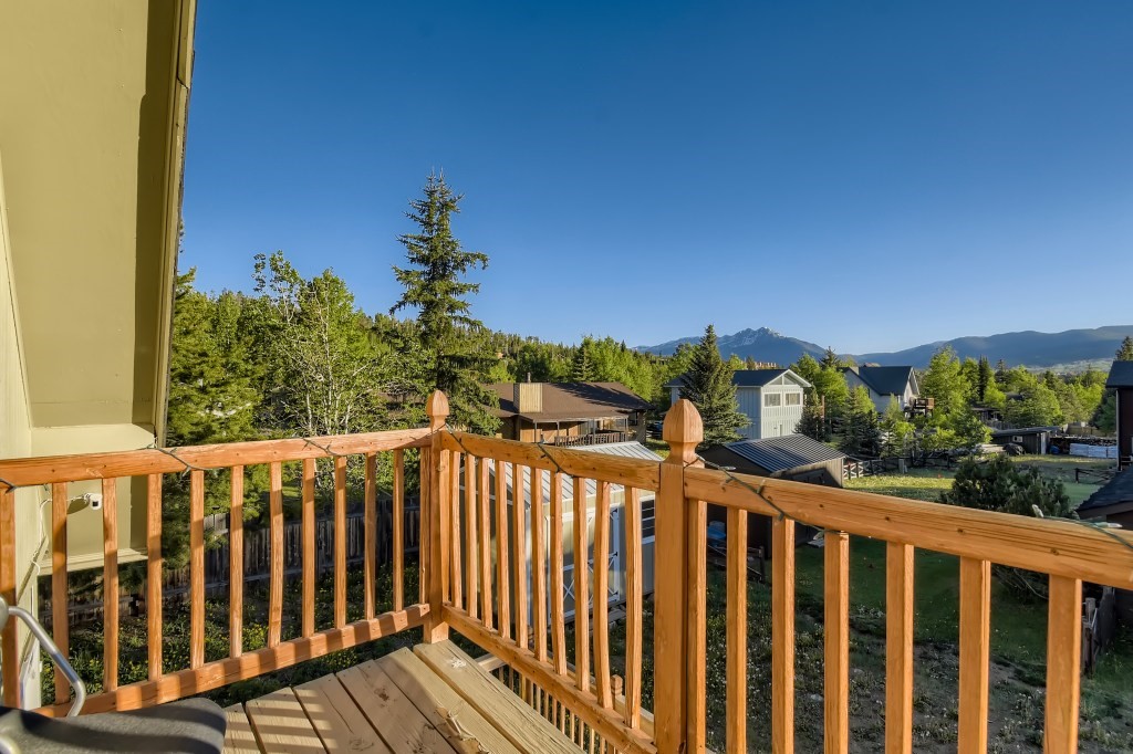 402 Alpine Road Dillon, CO 80435 - Photo 15 of 21 a view of a street with wooden fence