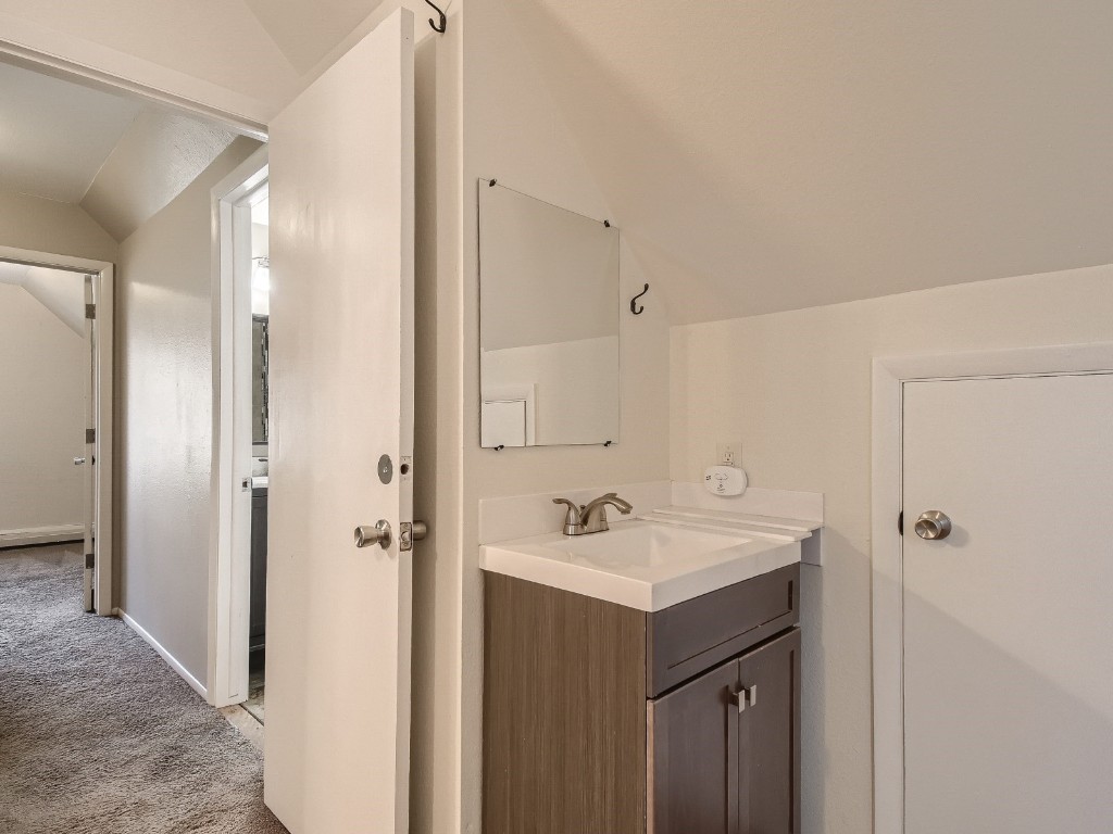 402 Alpine Road Dillon, CO 80435 - Photo 17 of 21 a bathroom with a sink a mirror and a shower
