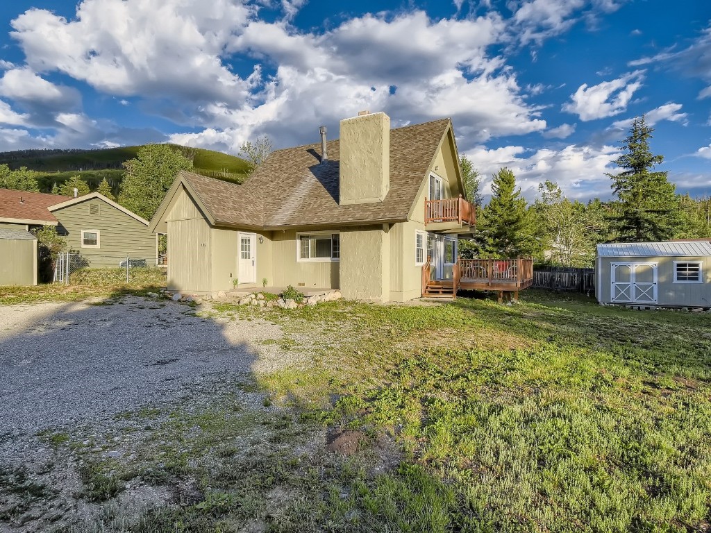 402 Alpine Road Dillon, CO 80435 - Photo 2 of 21 a view of a house with a garden
