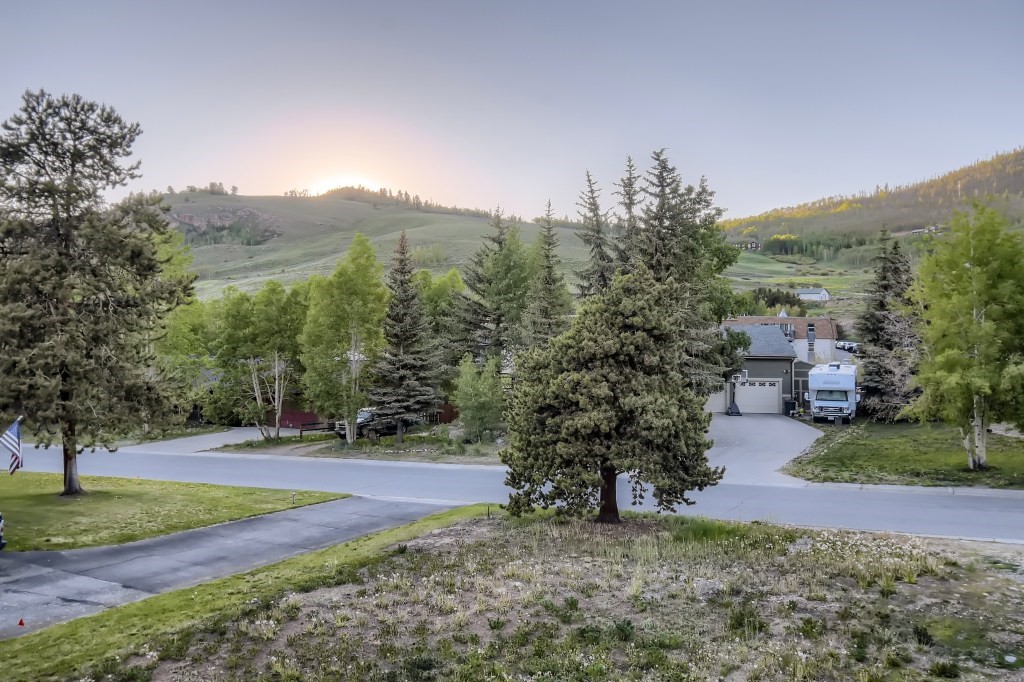 402 Alpine Road Dillon, CO 80435 - Photo 21 of 21 a view of a field with mountains in the background