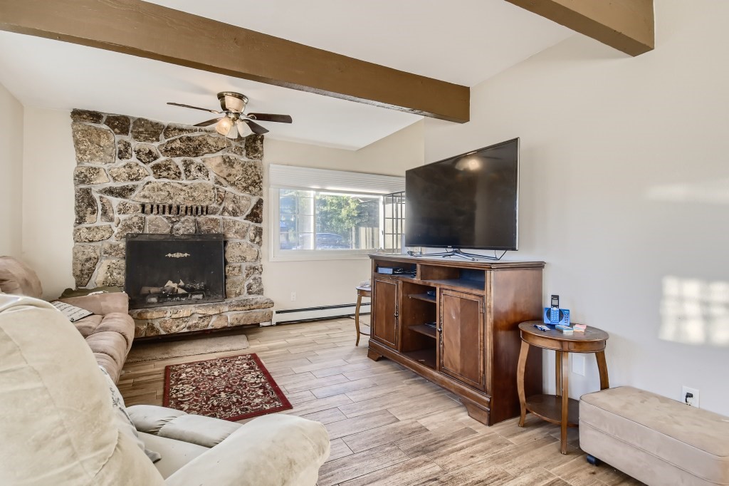402 Alpine Road Dillon, CO 80435 - Photo 4 of 21 a living room with furniture and a flat screen tv
