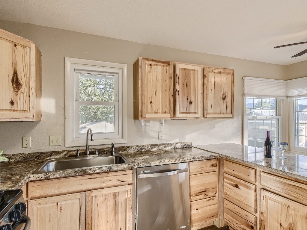 402 Alpine Road Dillon, CO 80435 - Photo 6 of 21 a kitchen with a sink cabinets and window