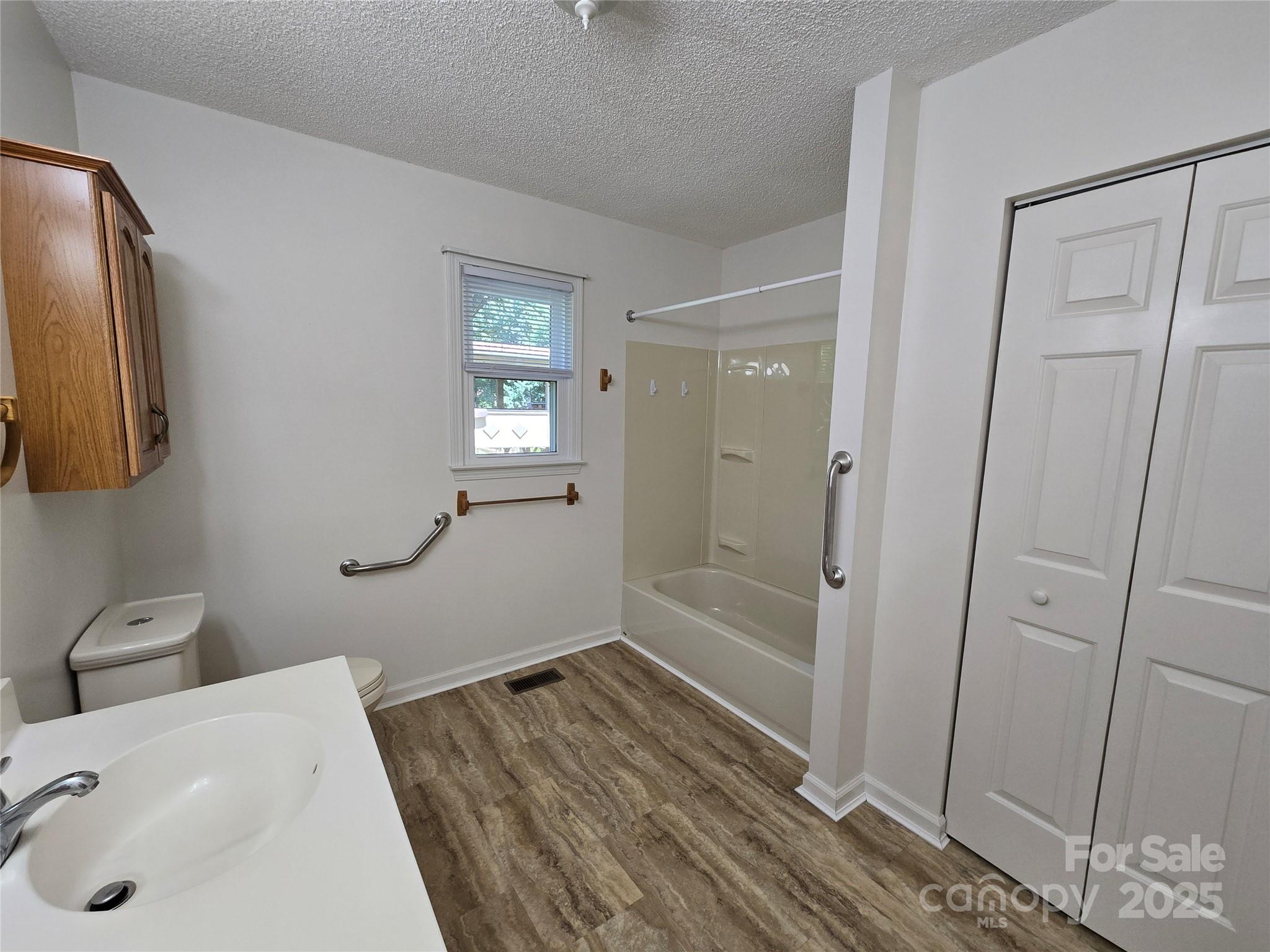 5238 Bethel Church Road Hickory, NC 28602 - Photo 20 of 22 a bathroom with a sink and a shower