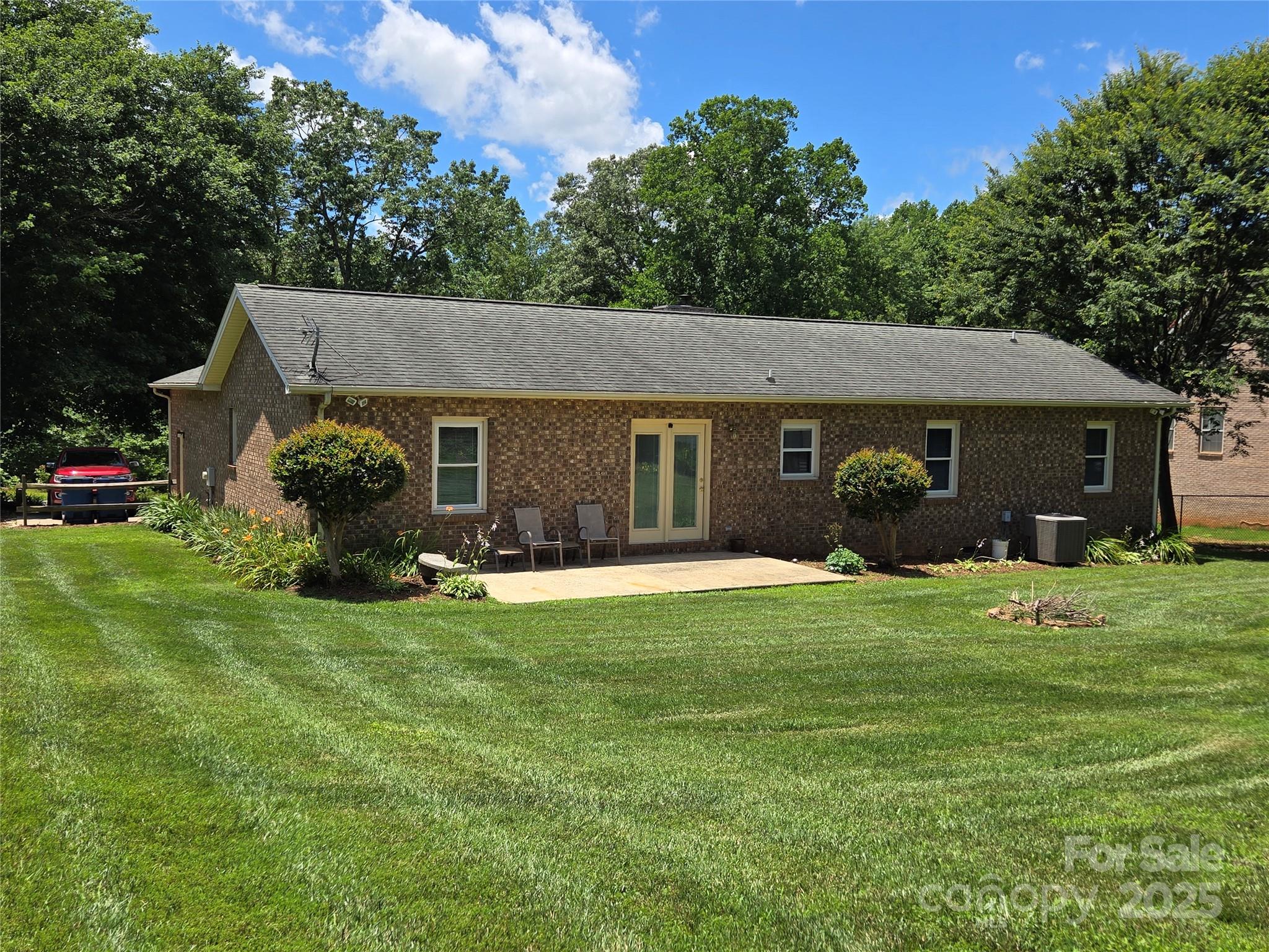 5238 Bethel Church Road Hickory, NC 28602 - Photo 5 of 22 a front view of a house with a garden and trees