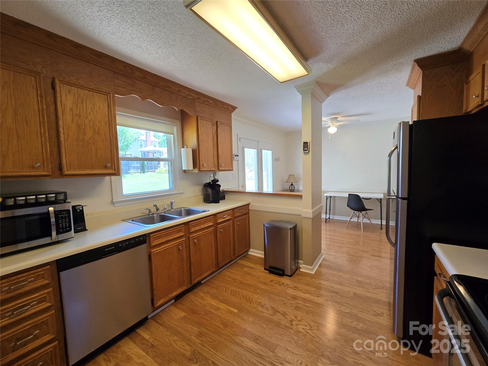 5238 Bethel Church Road Hickory, NC 28602 - Photo 10 of 22 a kitchen with a sink appliances and cabinets