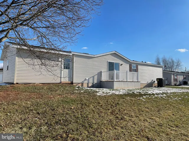 a view of a house with a patio