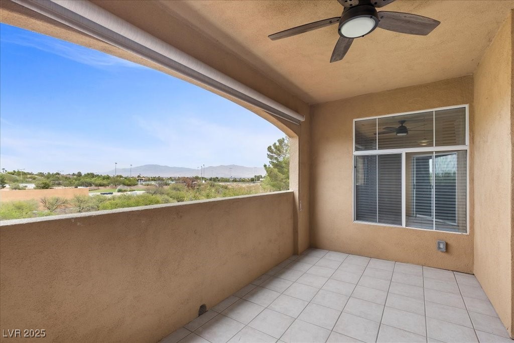 8716 Red Rio Drive, Unit 203 Las Vegas, NV 89128 - Photo 22 of 62 Balcony access from Living Room and Primary Bedroom