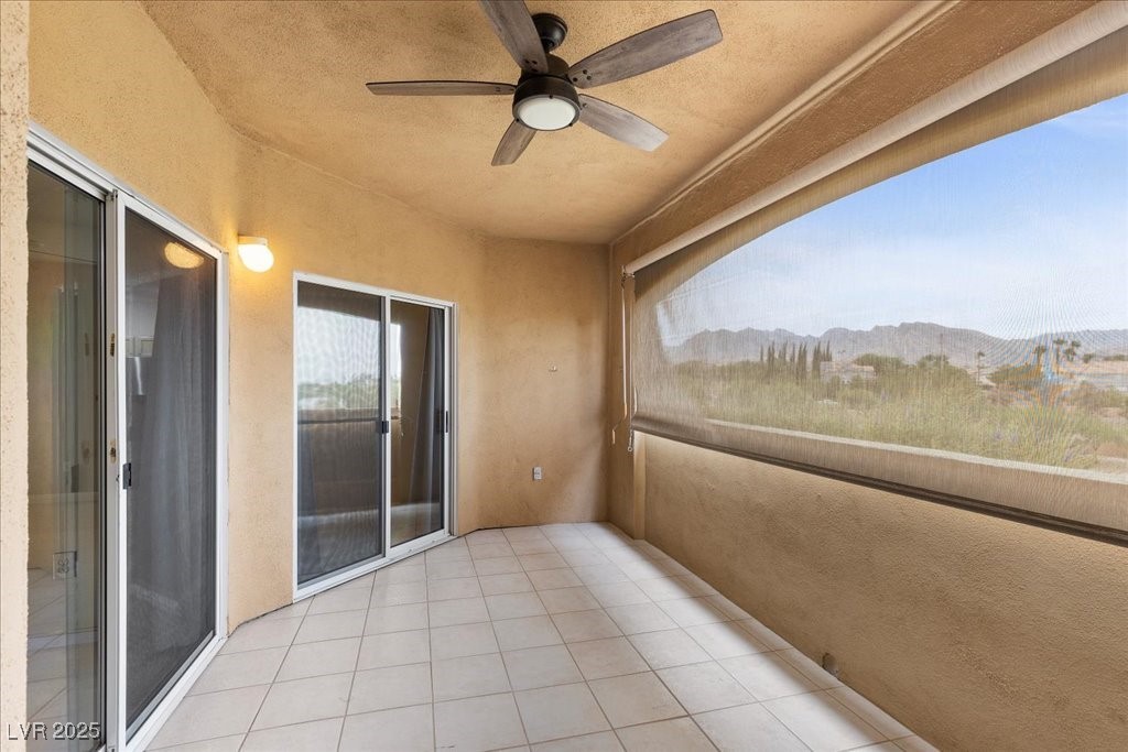 8716 Red Rio Drive, Unit 203 Las Vegas, NV 89128 - Photo 23 of 62 Balcony access from Living Room and Primary Bedroom