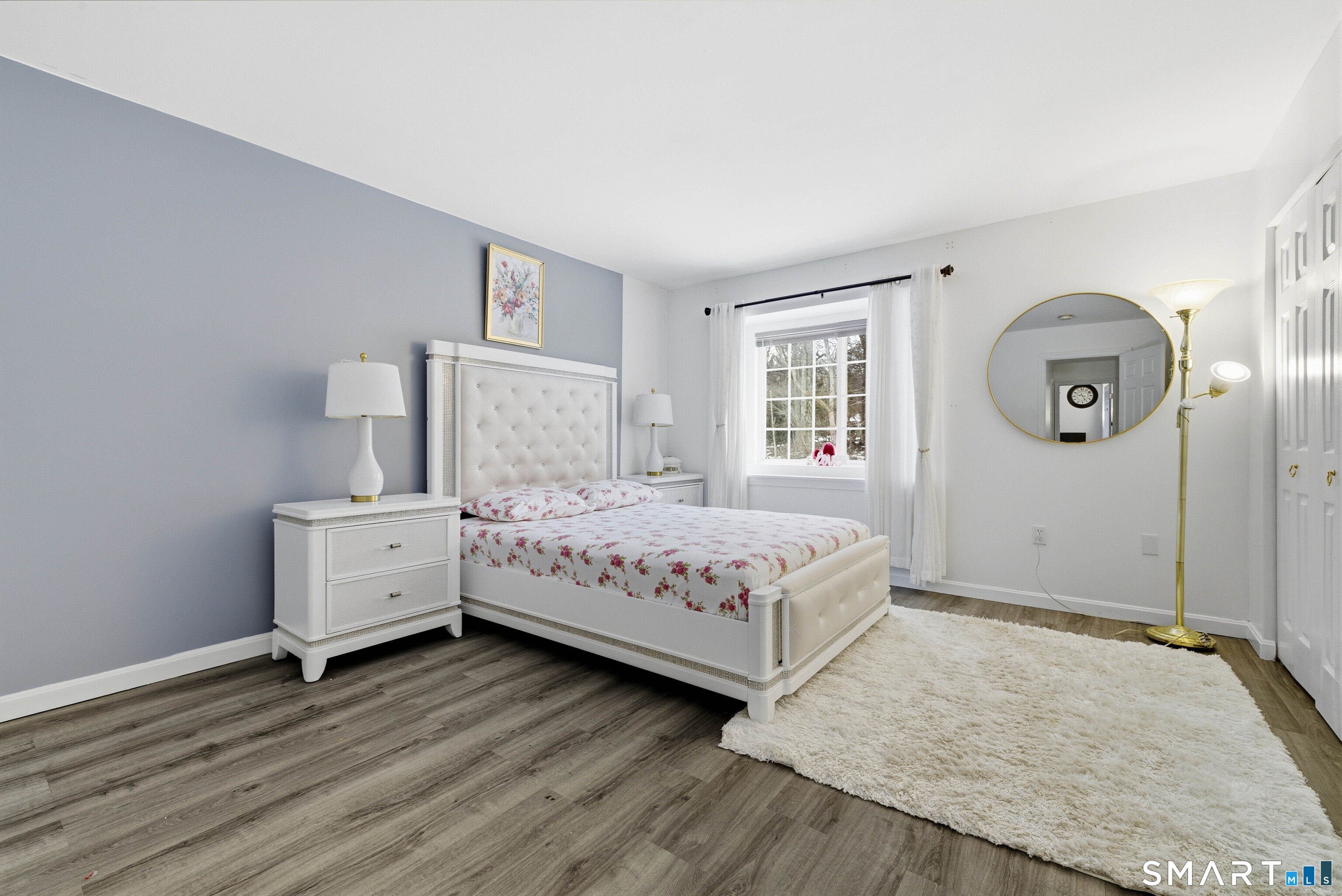 310 Boston Post Road, Unit 76 Waterford, CT 06385 - Photo 20 of 40 a bedroom with a bed and a window