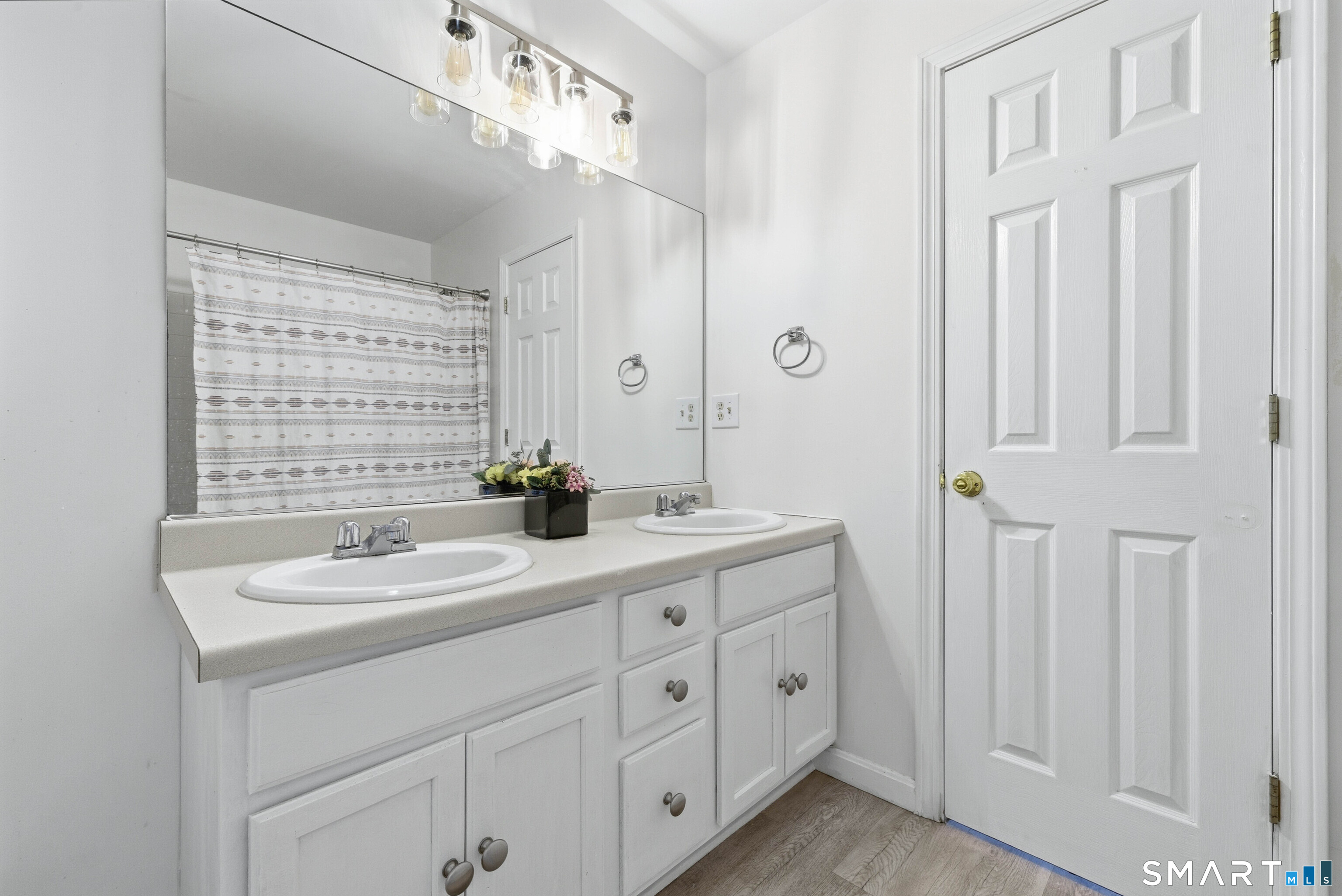 310 Boston Post Road, Unit 76 Waterford, CT 06385 - Photo 26 of 40 a spacious bathroom with double vanity a mirror a vanity and a shower
