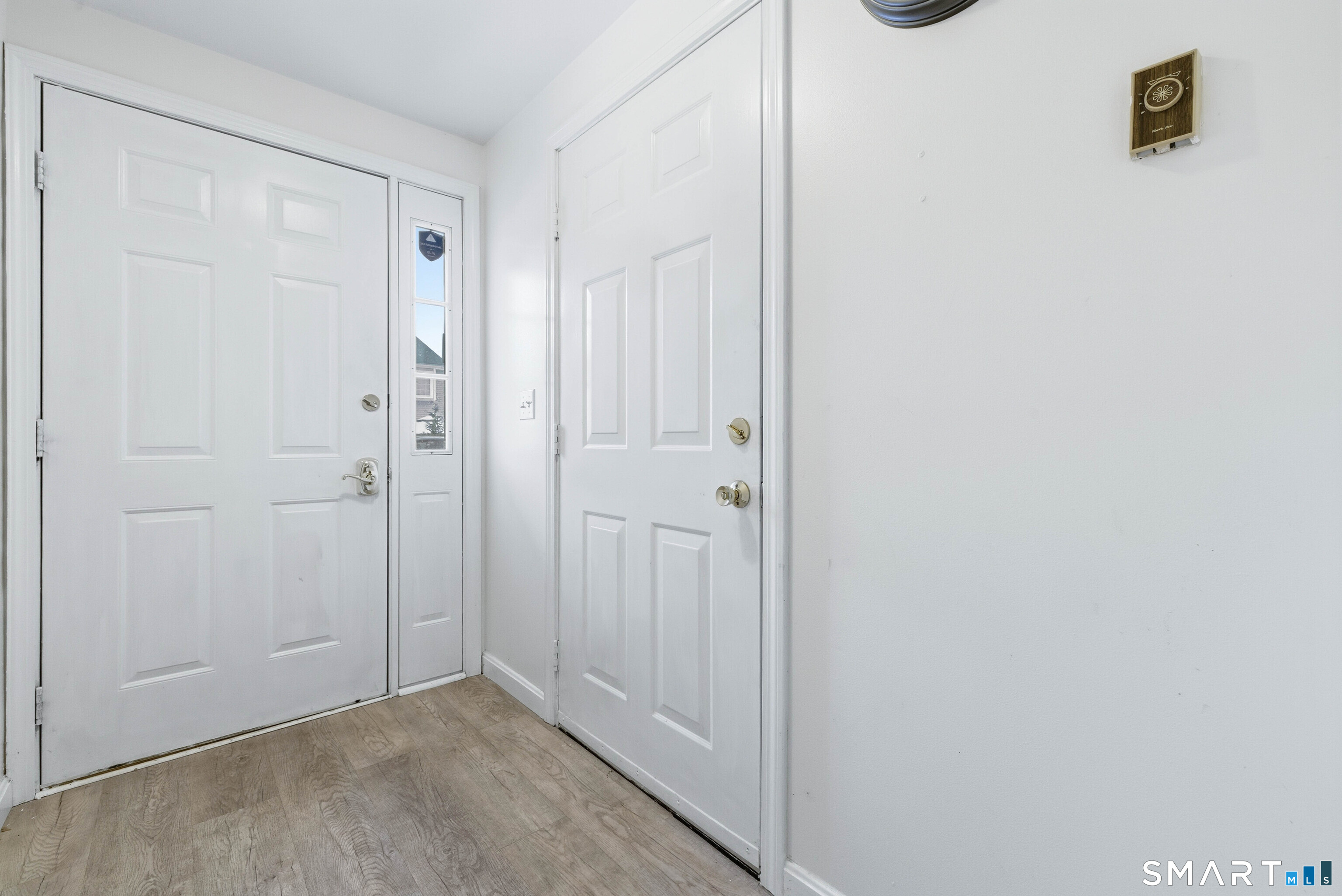 310 Boston Post Road, Unit 76 Waterford, CT 06385 - Photo 31 of 40 a view of room with shower hardwood