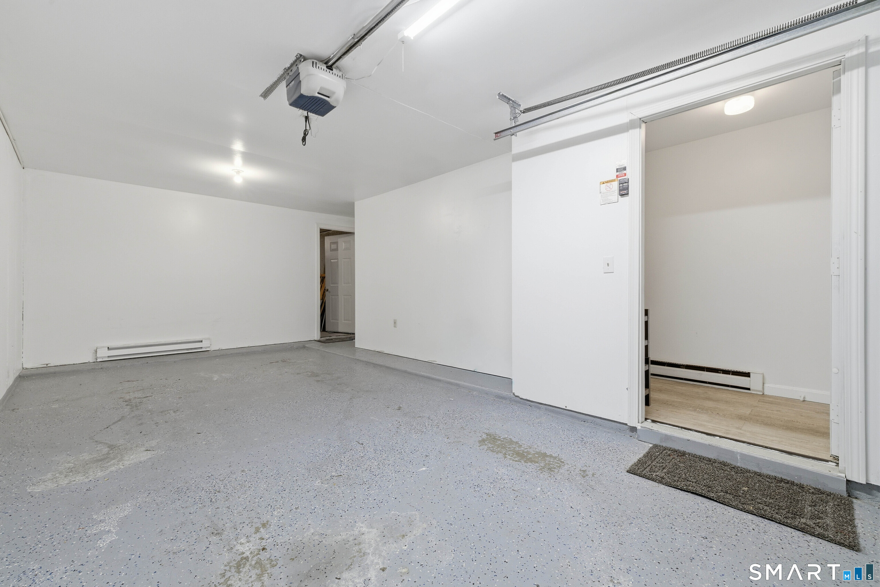 310 Boston Post Road, Unit 76 Waterford, CT 06385 - Photo 32 of 40 en empty room with ceiling fan and windows