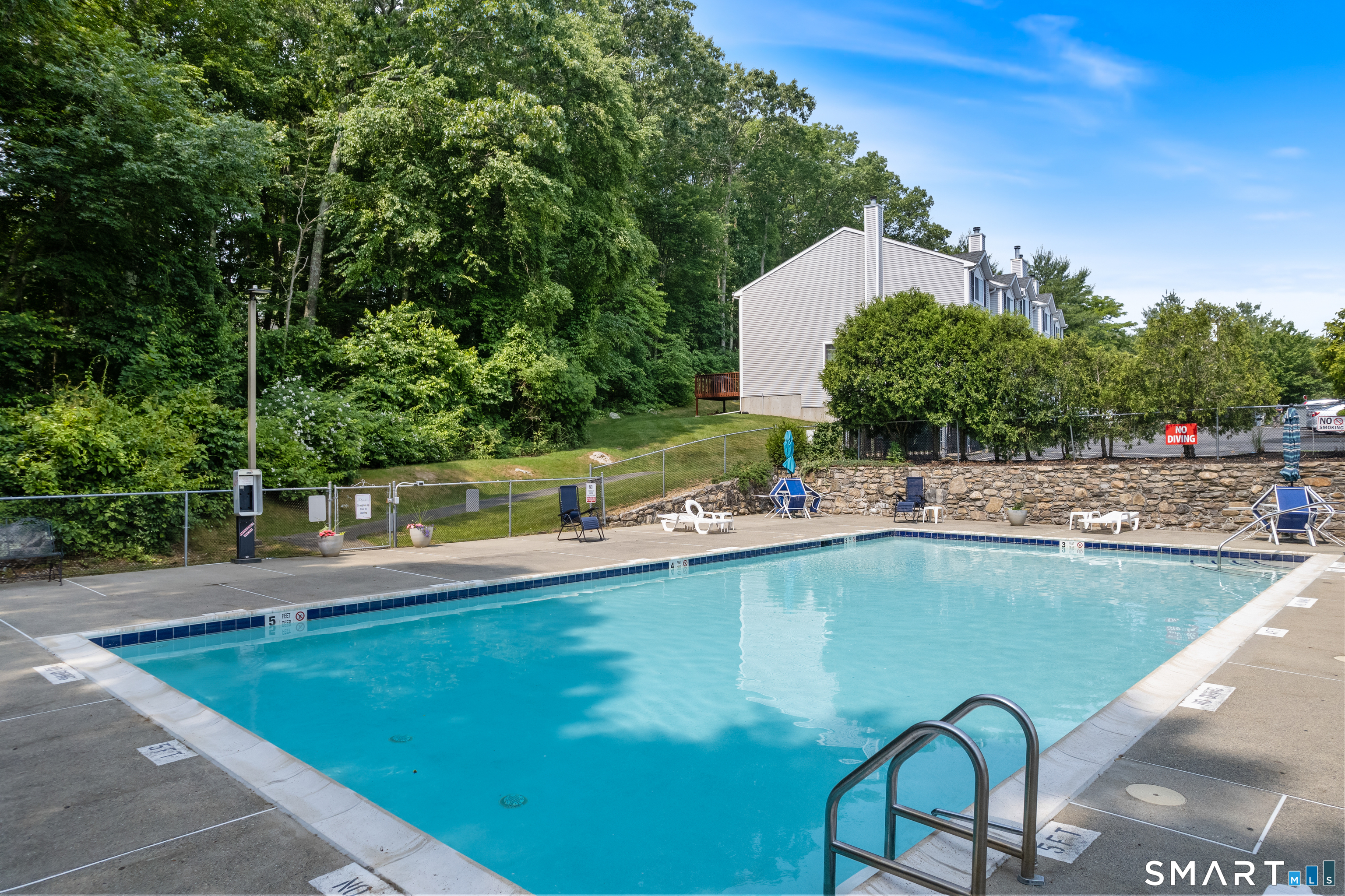 310 Boston Post Road, Unit 76 Waterford, CT 06385 - Photo 38 of 40 a view of a swimming pool with a patio