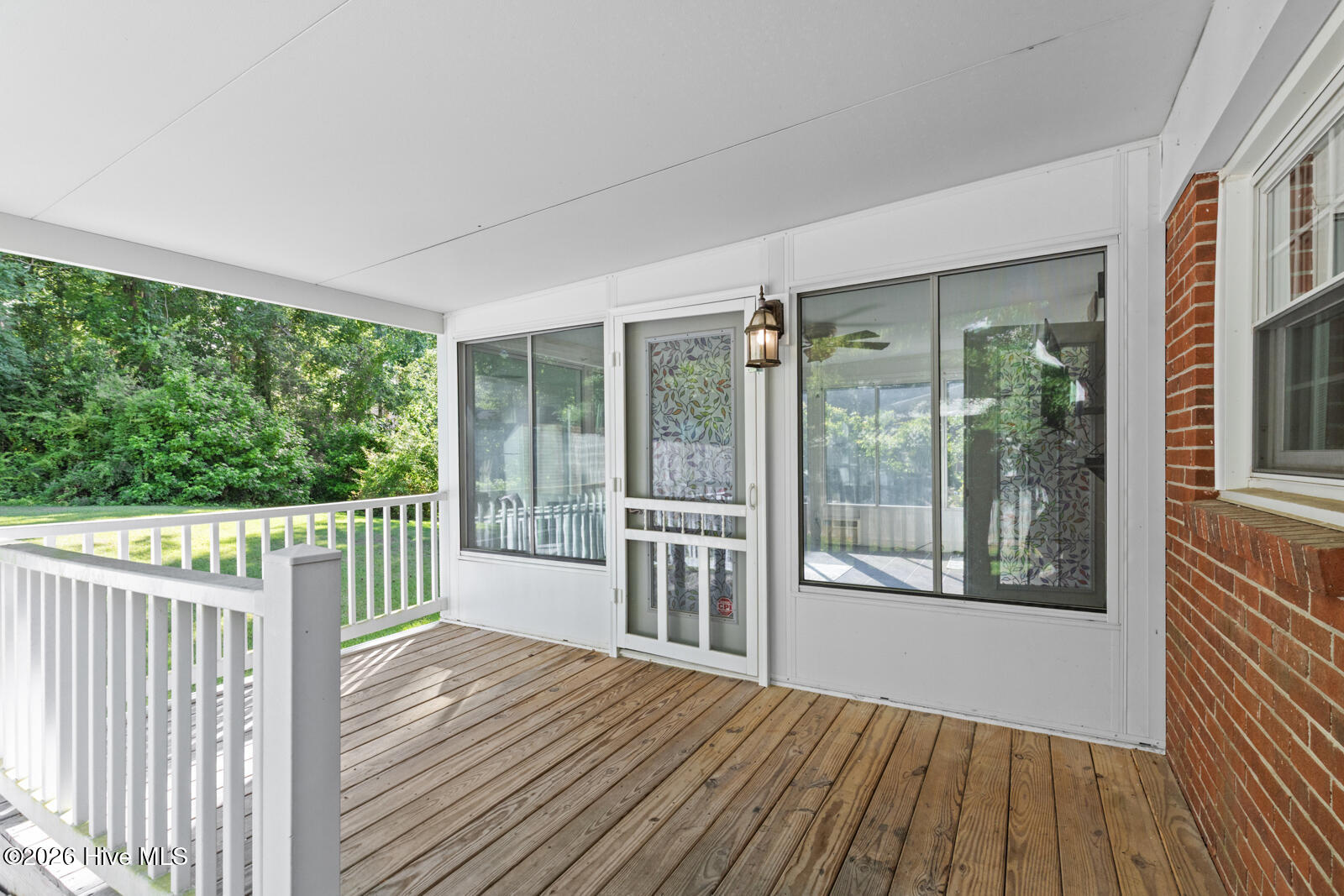 6 Laran Road Jacksonville, NC 28540 - Photo 36 of 41 From The Sunroom Onto The Covered Deck