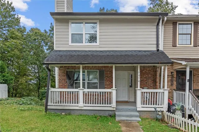 front view of a house with a deck