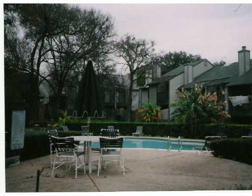 3801 Manchaca Road, Unit 1 Austin, TX 78704 - Photo 1 of 1 a view of a bench in a garden