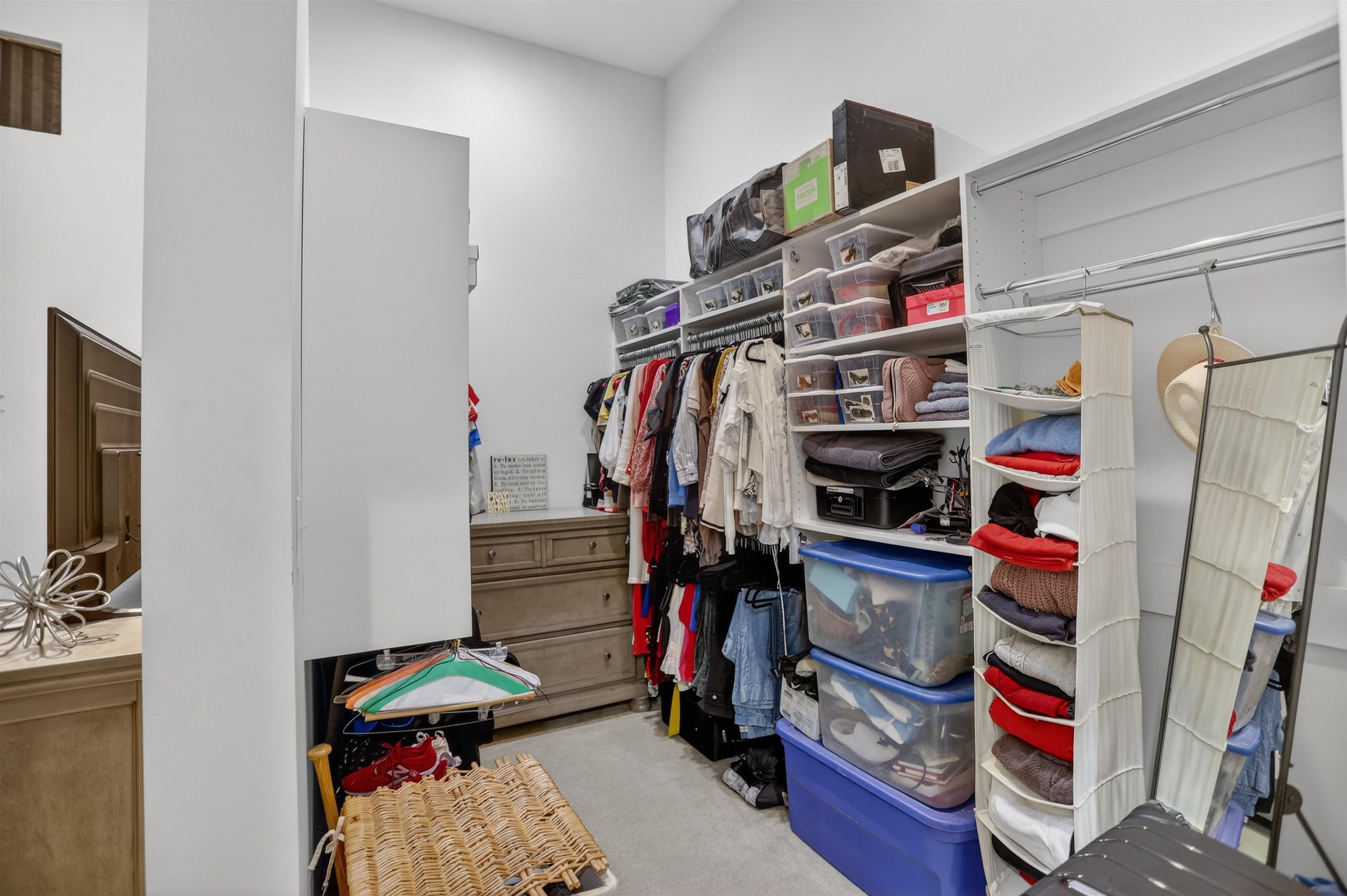 435 South Front Street, Unit 307 Memphis, TN 38103 - Photo 20 of 40 a view of walk in closet with clothes and shoes