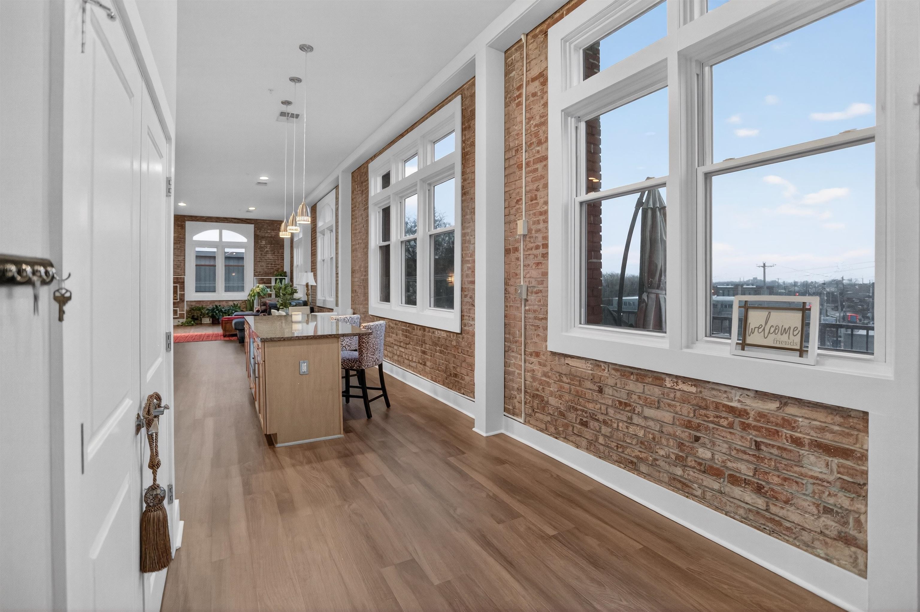 435 South Front Street, Unit 307 Memphis, TN 38103 - Photo 3 of 40 a view of a living room and entry way