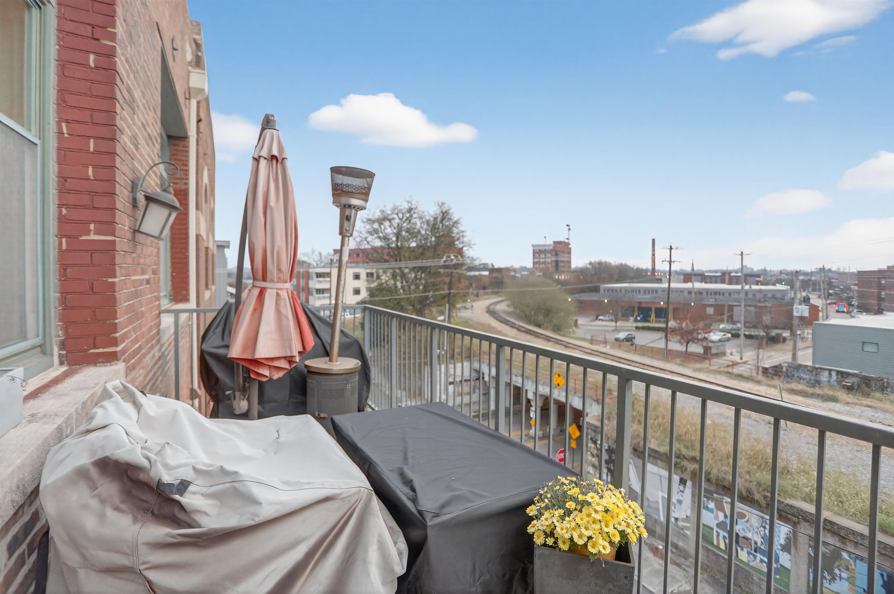 435 South Front Street, Unit 307 Memphis, TN 38103 - Photo 32 of 40 a view of a balcony with chairs