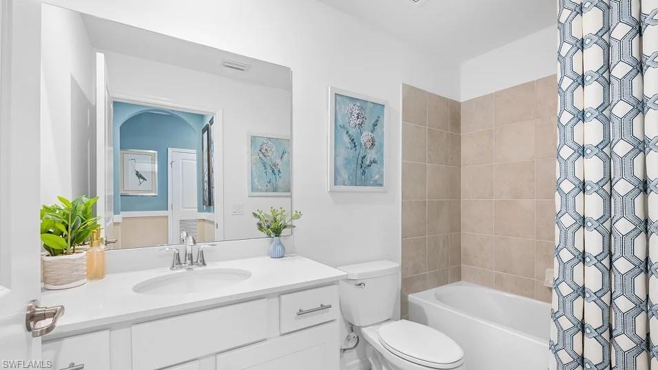 5491 Double Eagle Circle, Unit 3723 Ave Maria, FL 34142 - Photo 12 of 42 Bathroom with vanity and shower / tub combo